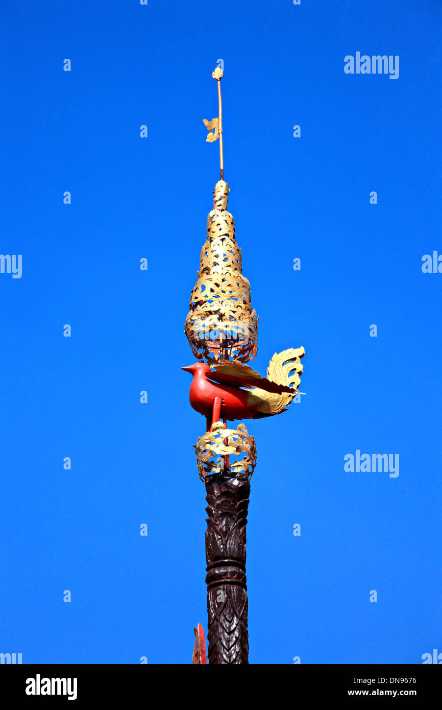 Artistic poles of Thailand style on blue sky. Stock Photo