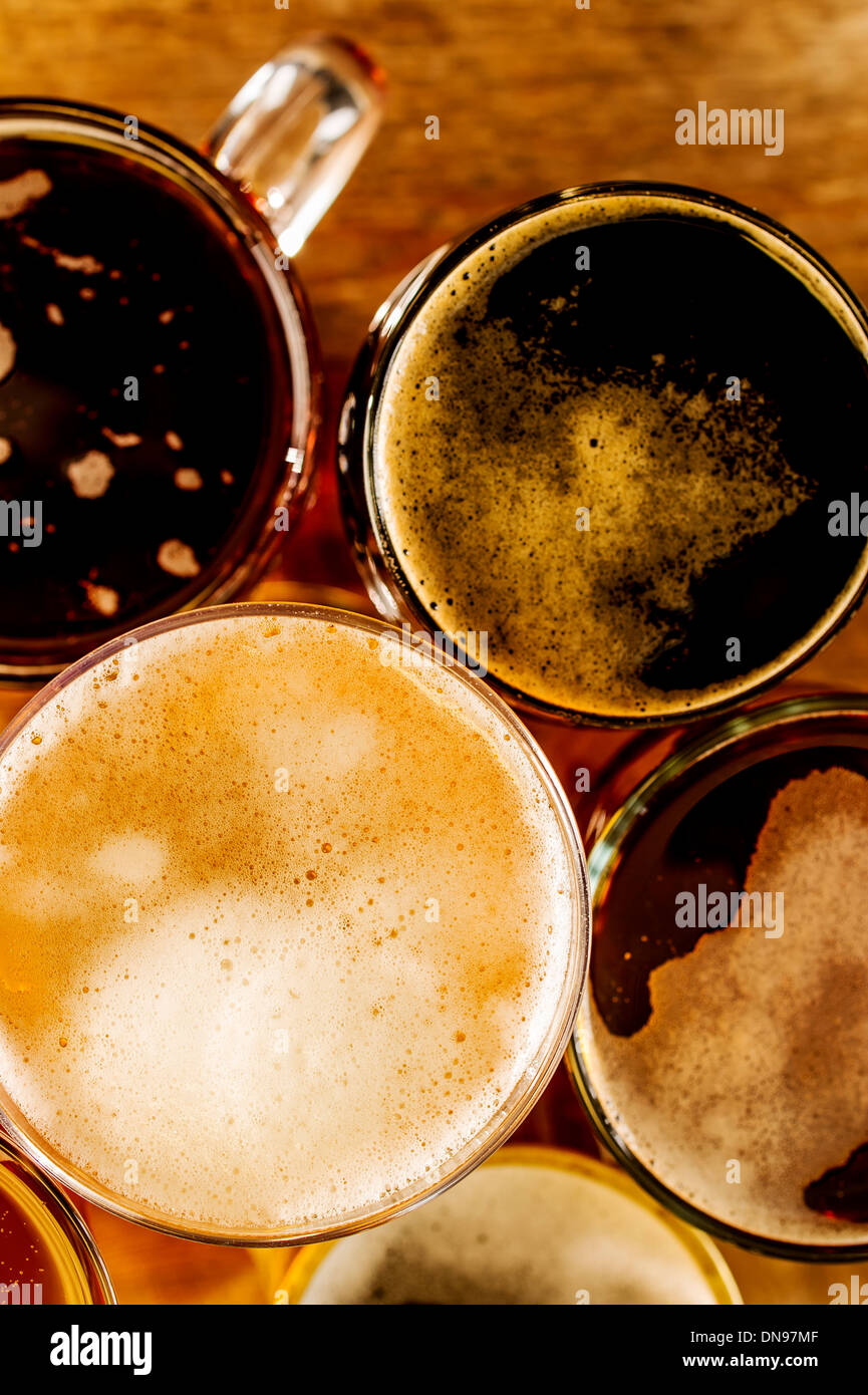 Pints of ale and beer in glasses on a table, UK Stock Photo