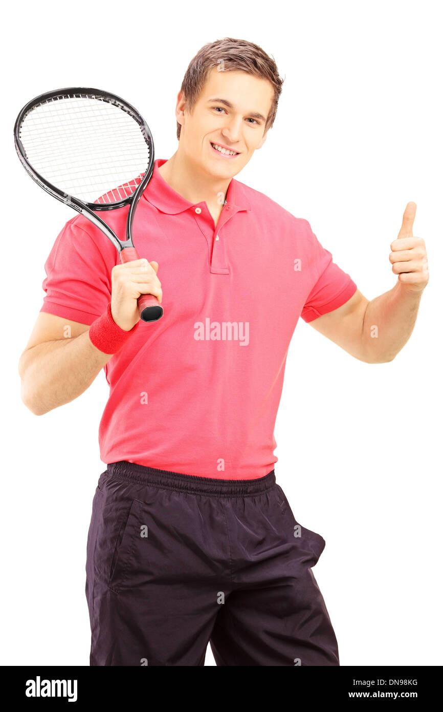 Young smiling man holding a tennis racket and giving thumb up Stock ...