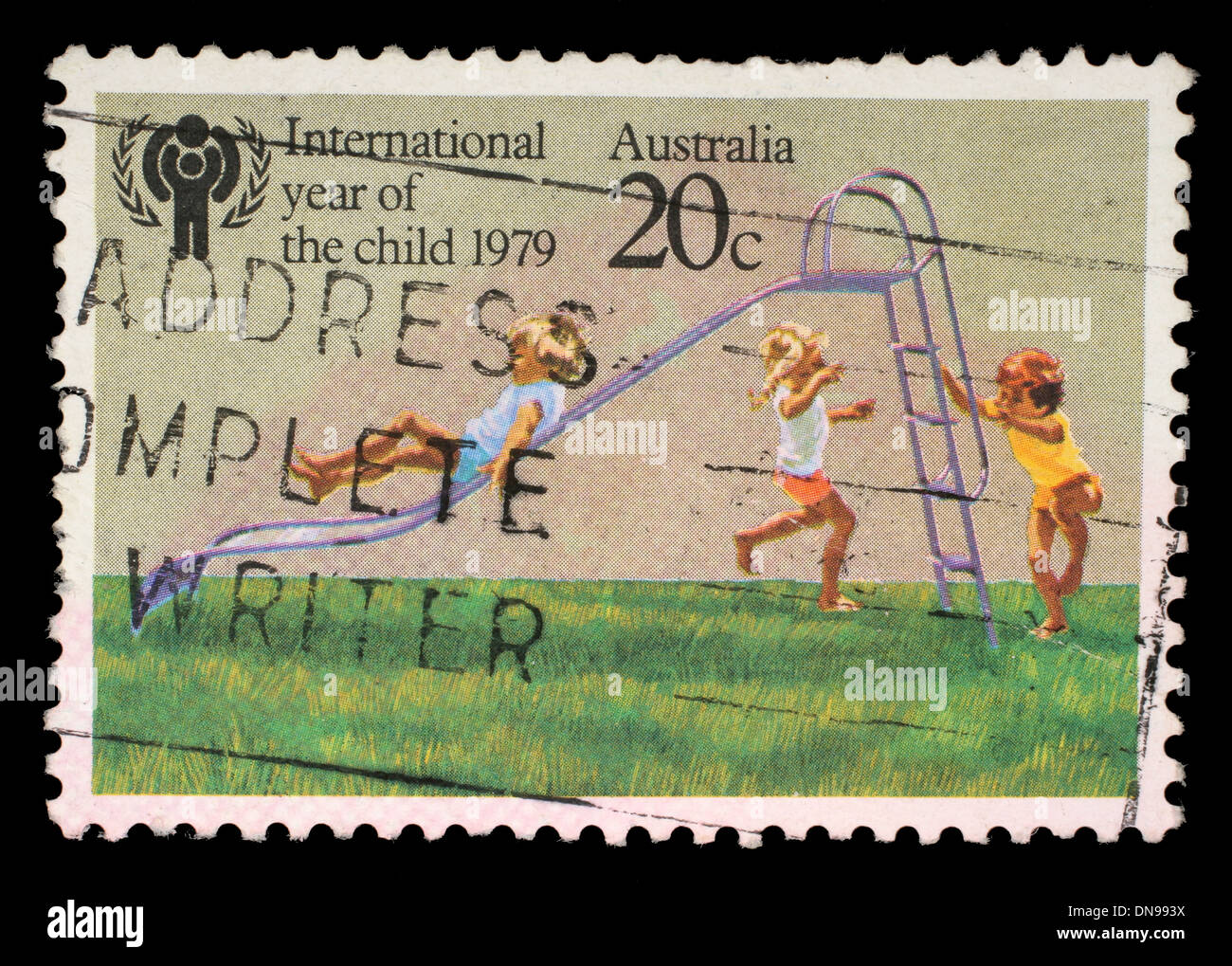 Stamp printed in Australia from the 'International Year of the Child' issue shows Children playing on Slide, circa 1979. Stock Photo