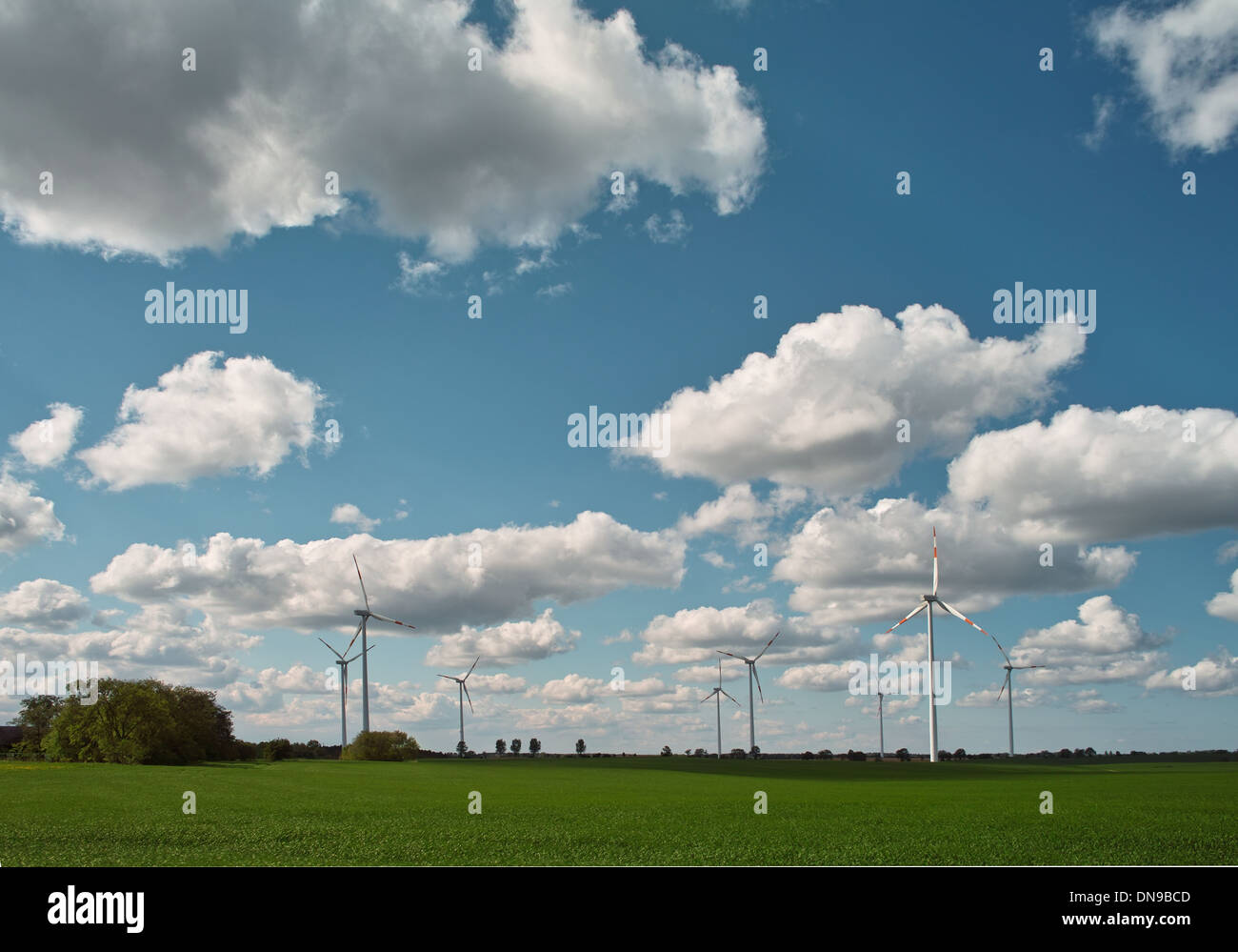 wind turbine on blue sky background Stock Photo - Alamy