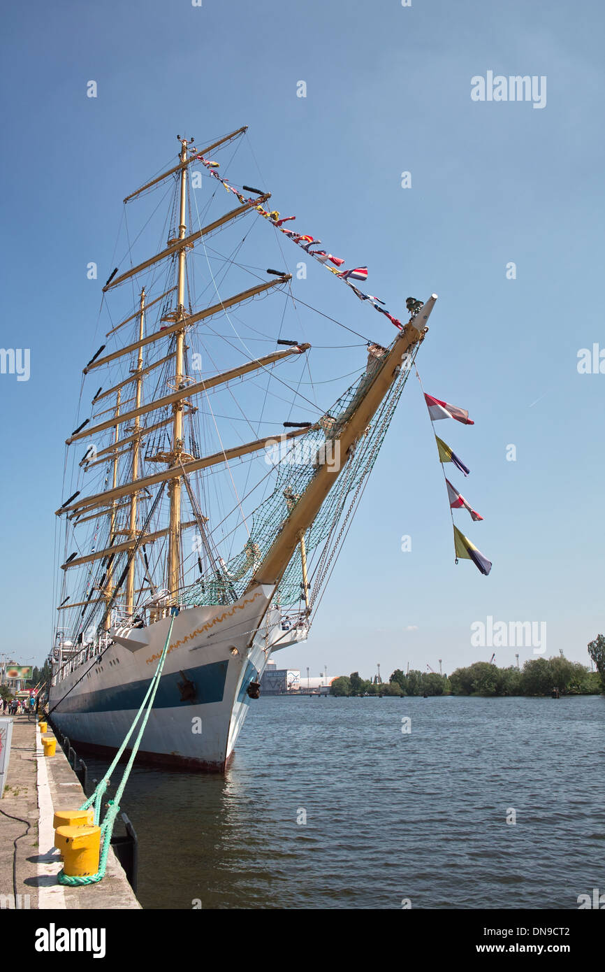 sailingship near embankment on a sky background Stock Photo Alamy