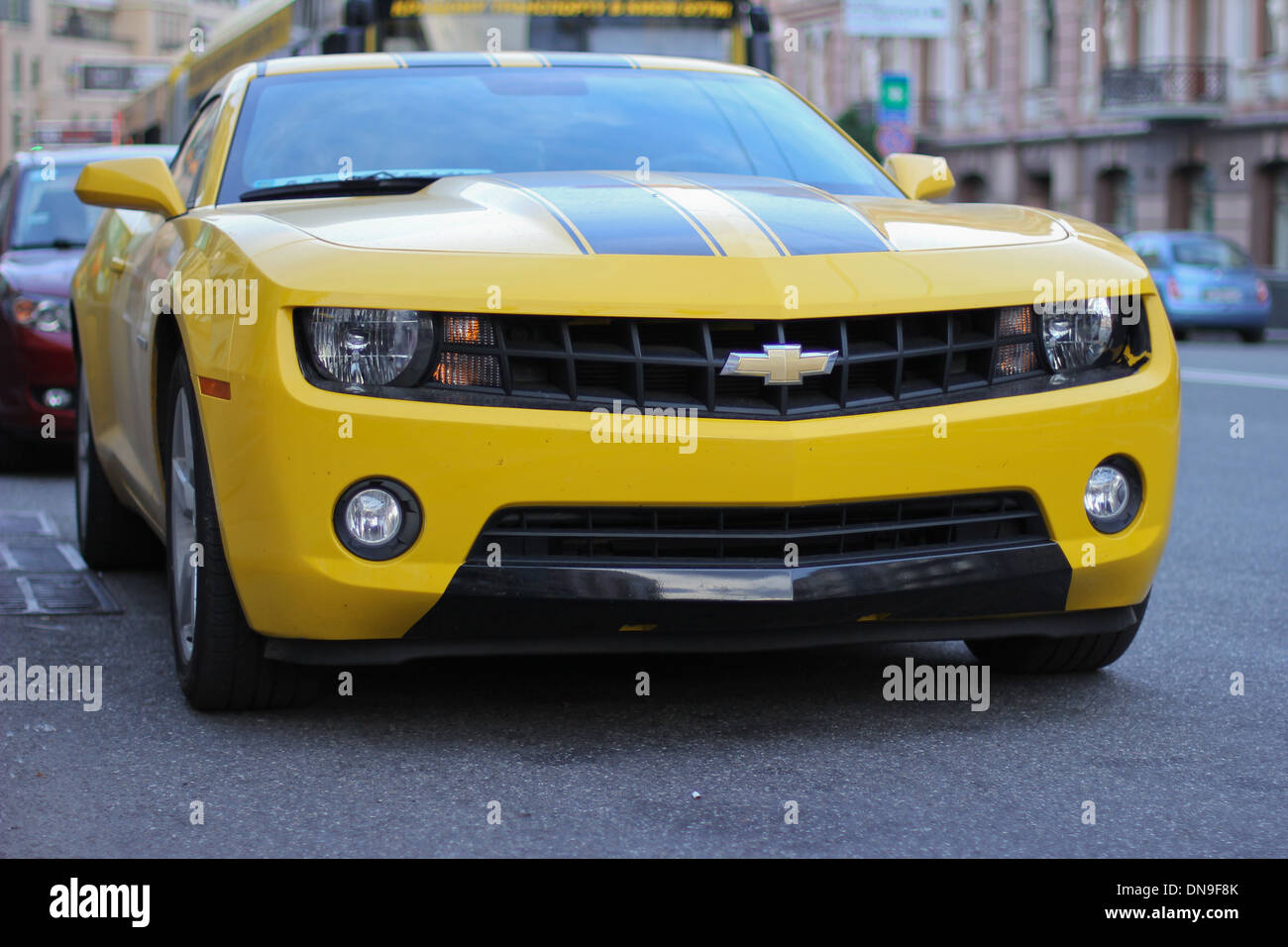 Yellow car Chevrolet Camaro on the street Stock Photo
