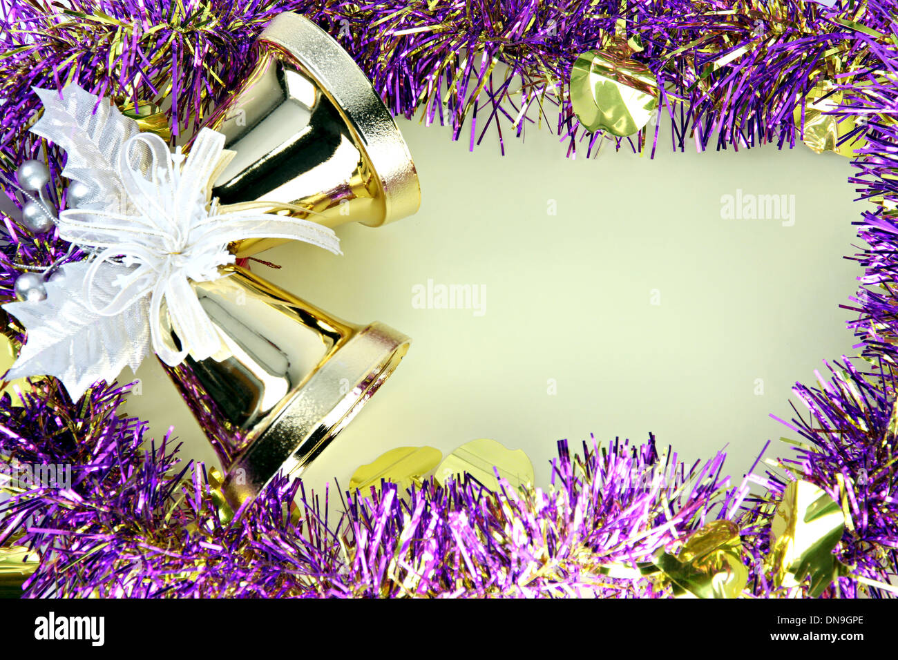 Crispy golden bells and decorations ribbon can use it in Christmas and New Year. Stock Photo