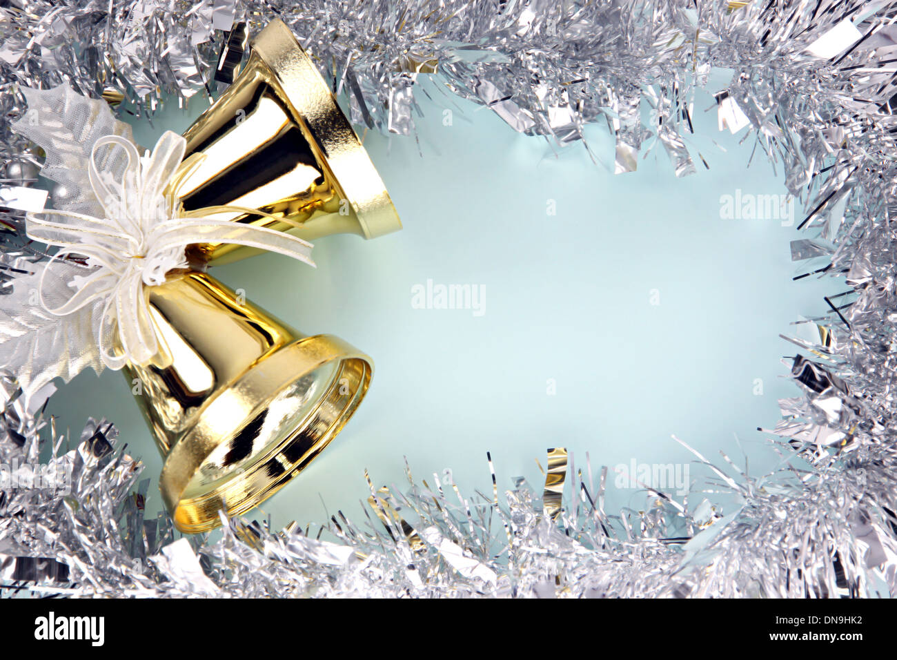 Crispy golden bells and decorations silver ribbon can use it in Christmas and New Year. Stock Photo