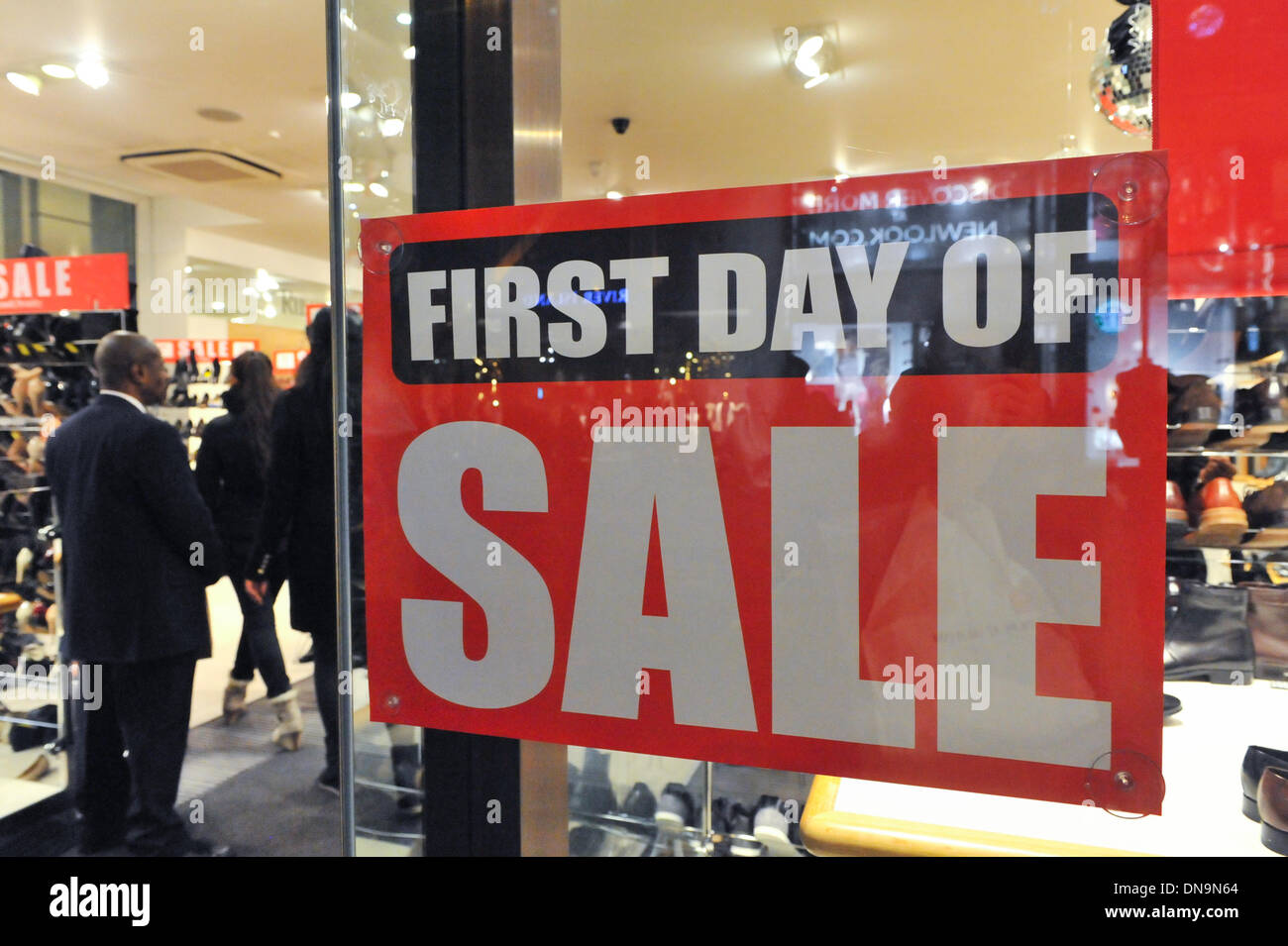 Oxford Street, London, UK. 20th December 2013. Sale signs in the window ...