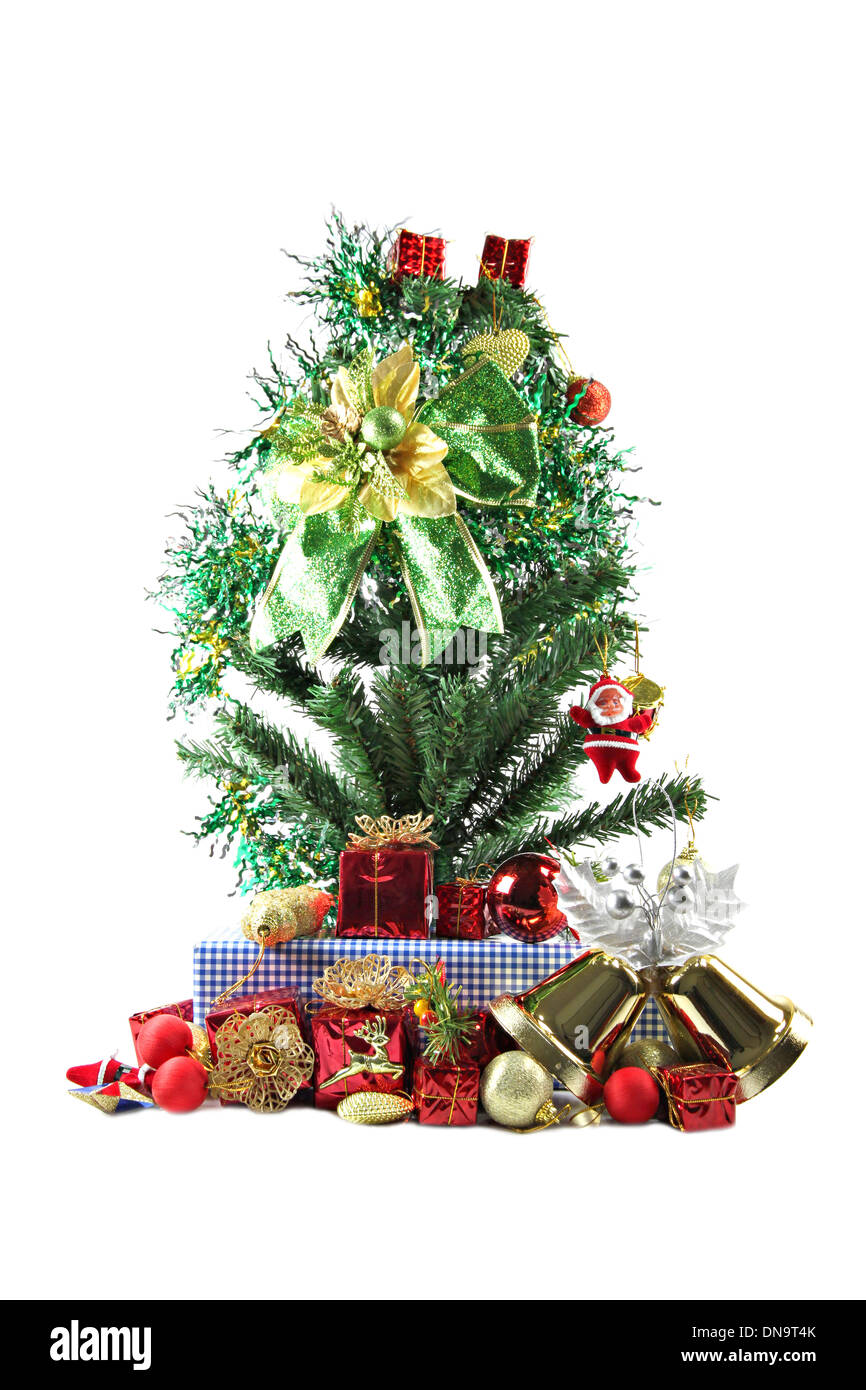 Green ribbon and Christmas trees and accessories with are placed. Stock Photo