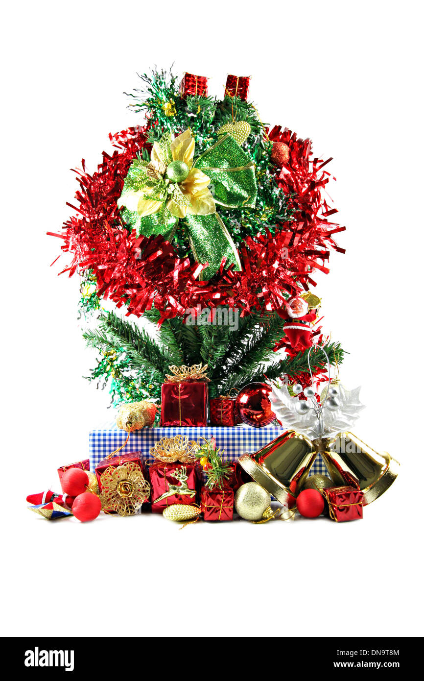 Red ribbon and Christmas trees and accessories with are placed. Stock Photo