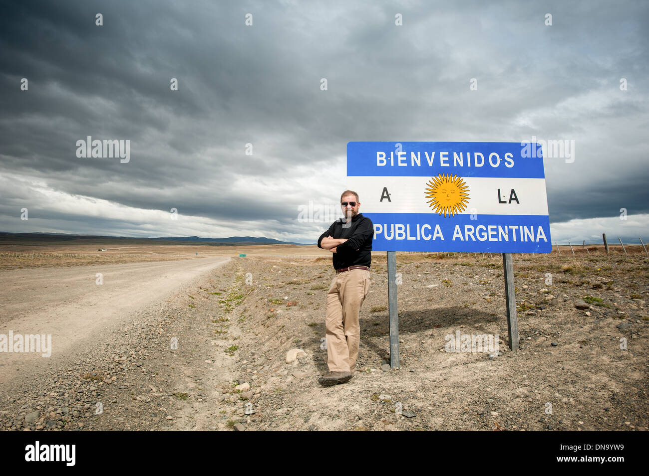 Man standing at Argentina border crossing with Chile Stock Photo