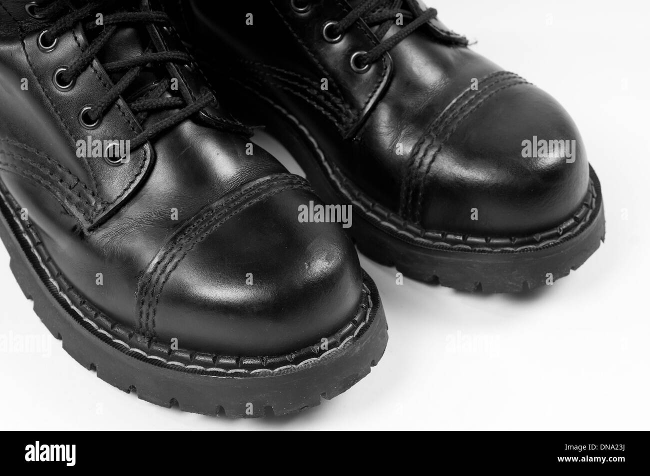 Pair of black leather bovver boots detail Stock Photo