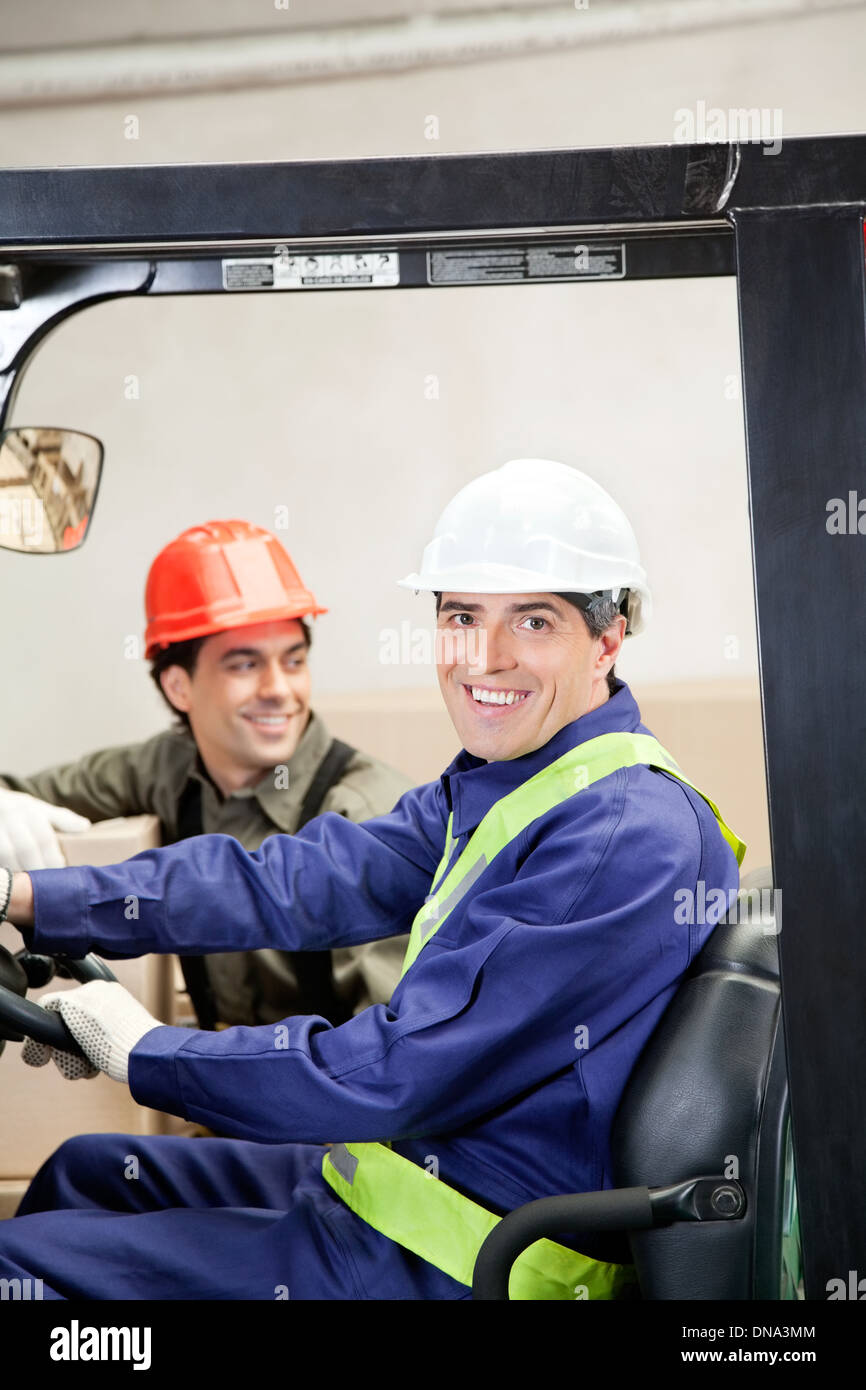 Casual portrait of two men in Warehouse Stock Photo