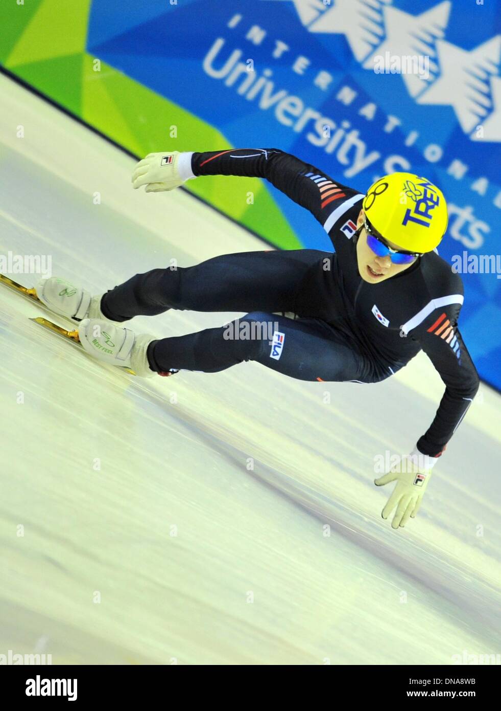 Trentino, Italy. 20th Dec, 2013. South Korea's Noh Jinkyu competes during the men's short track 1,000m final at the 26th Winter Universiade in Trentino, Italy, Dec. 20, 2013. Noh Jinkyu claimed the title with 1 minute and 25.506 seconds. Credit:  He Changshan/Xinhua/Alamy Live News Stock Photo