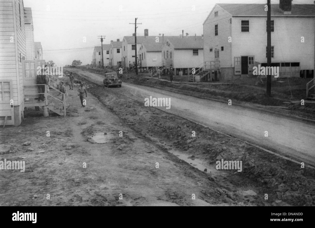 Military Buildings Along Muddy Road, WWII, 2nd Battalion, 389th Infantry, US Army Military Base Indiana, USA, 1942 Stock Photo