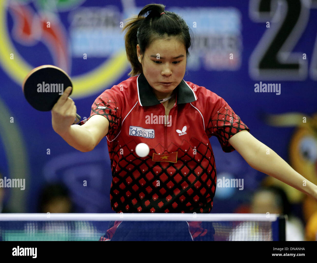 Nay Pyi Taw, Myanmar. 20th Dec, 2013. Thi Nha Nguyen of Vietnam competes  during the women's singles of table tennis against Stella Priska Palit of  Indonesia at the 27th SEA Games in