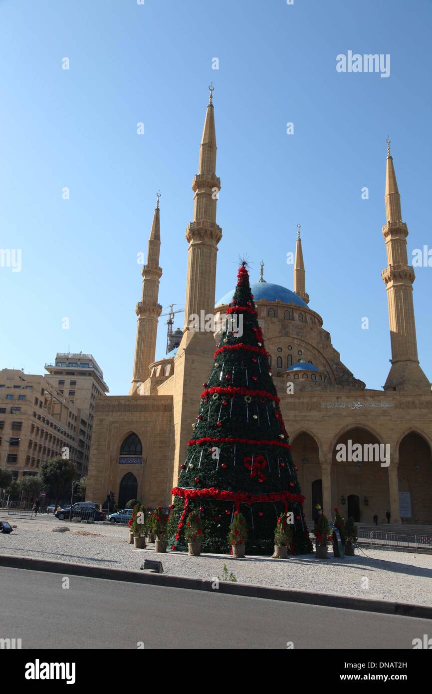 Beirut, Lebanon. 21st Dec, 2013. A Christmas tree is seen in front of a