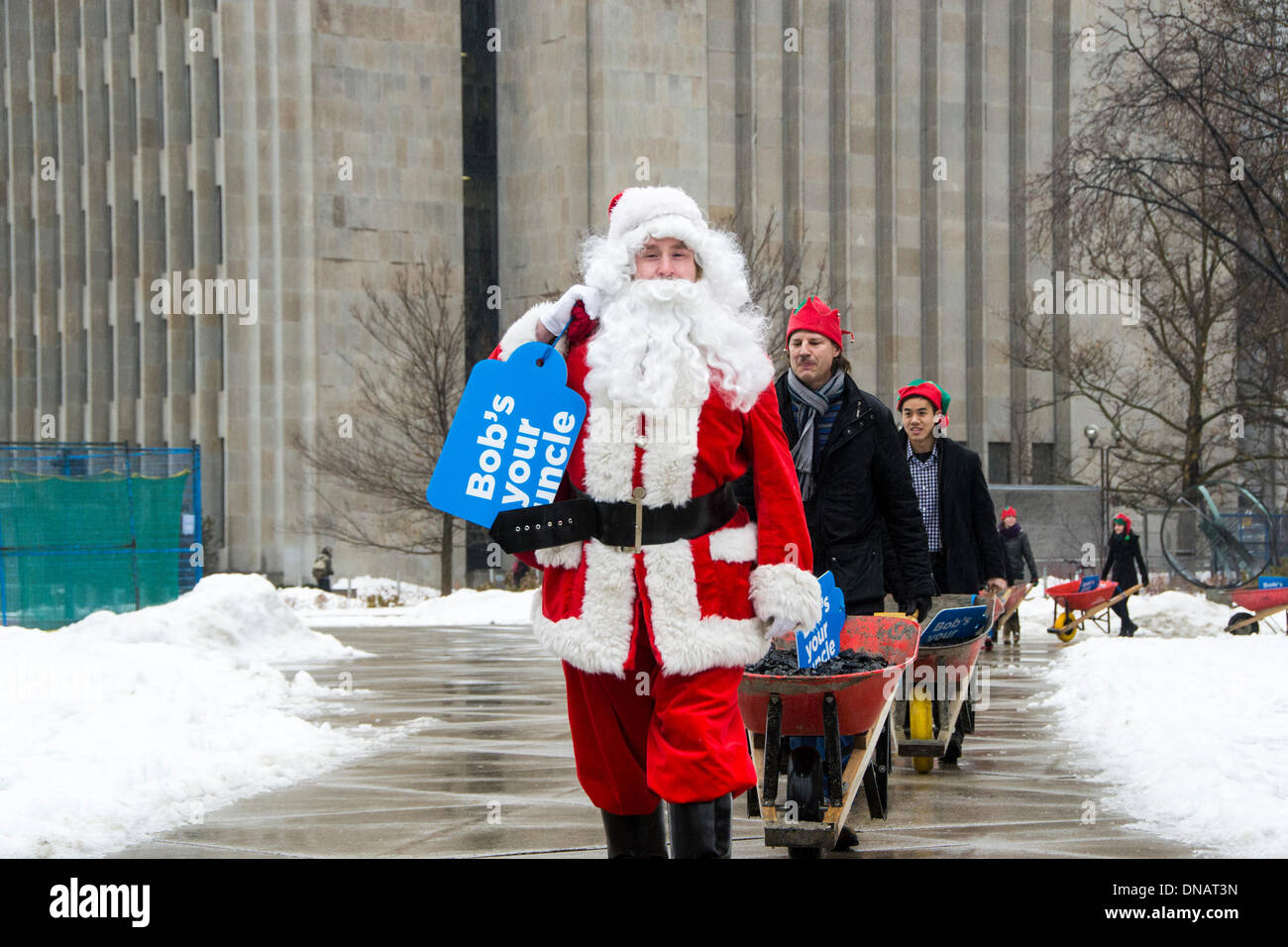 Toronto, Canada. 20th Dec 2013. Santa delivers coal to Toronto Mayor Rob Ford. Canada Credit:  Nisarg Photography/Alamy Live News Stock Photo