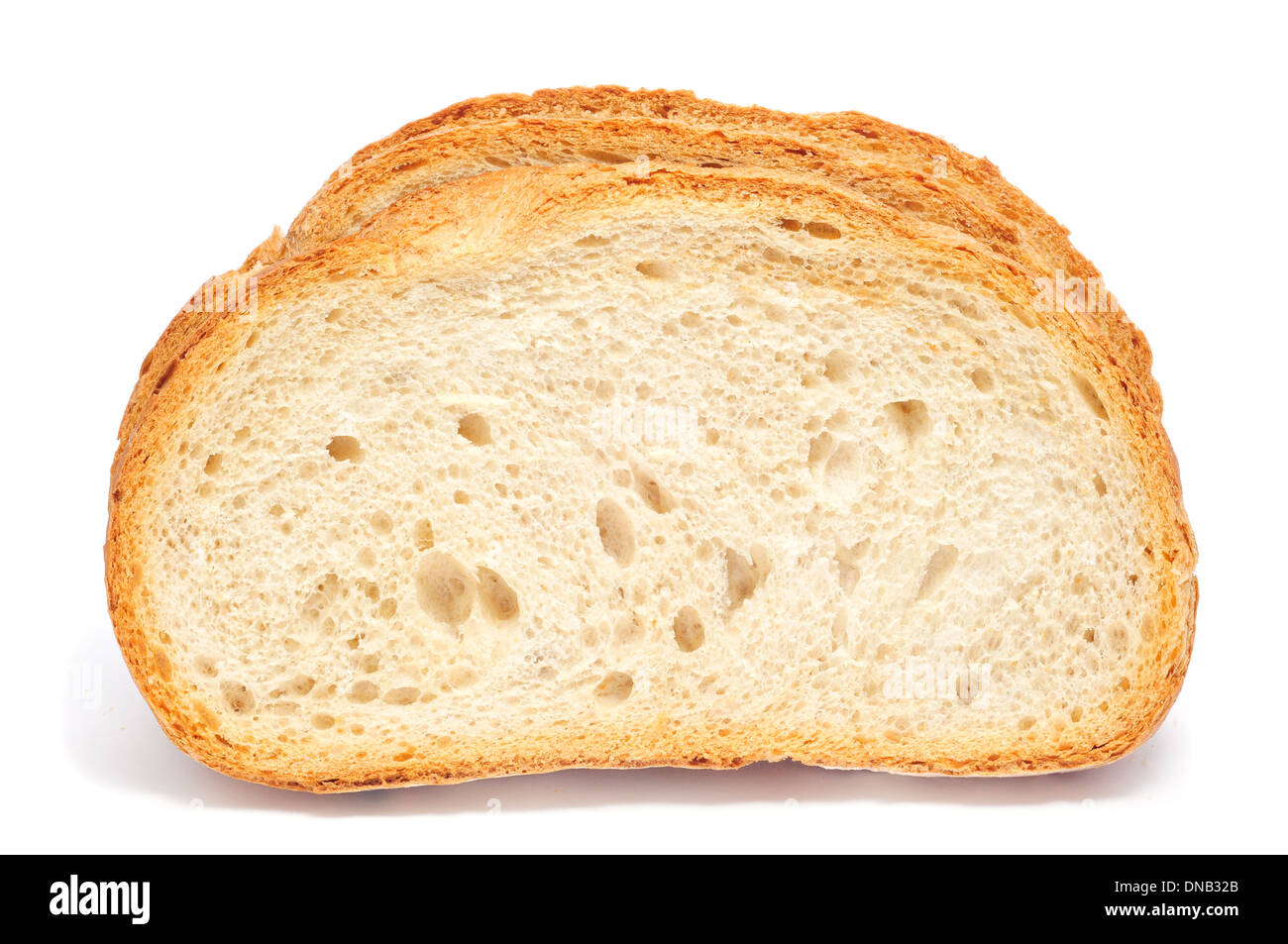 some slices of pan de payes, a round bread typical of Catalonia, Spain, on a white background Stock Photo