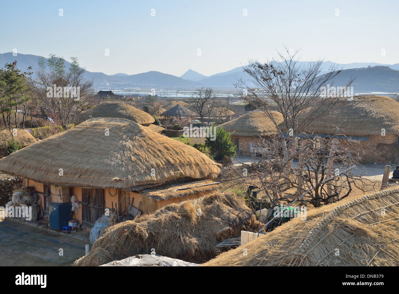 thatched roof house in Korean Traditional old town called NakAn in Korea Stock Photo