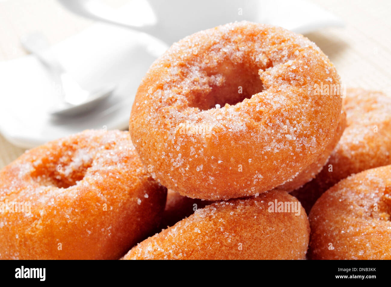 closeup of a pile of rosquillas, typical spanish donuts, on a set table