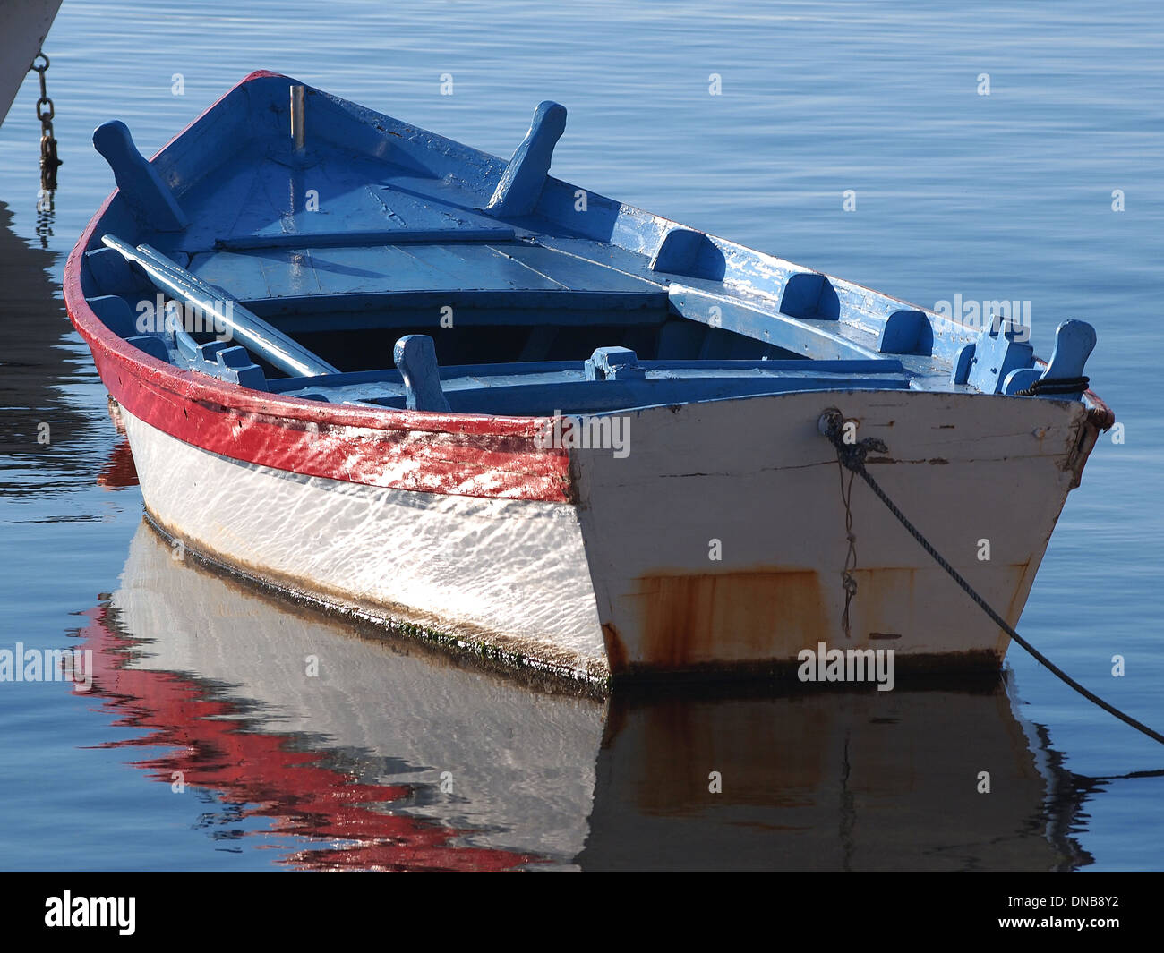 fishing boat and reflection in the sea Stock Photo