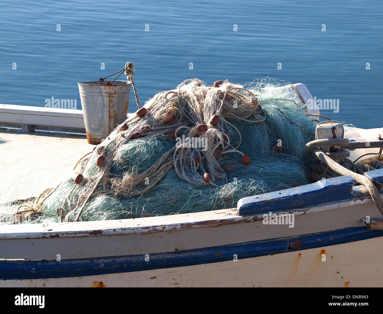 fishing net on old wooden boat Stock Photo Alamy