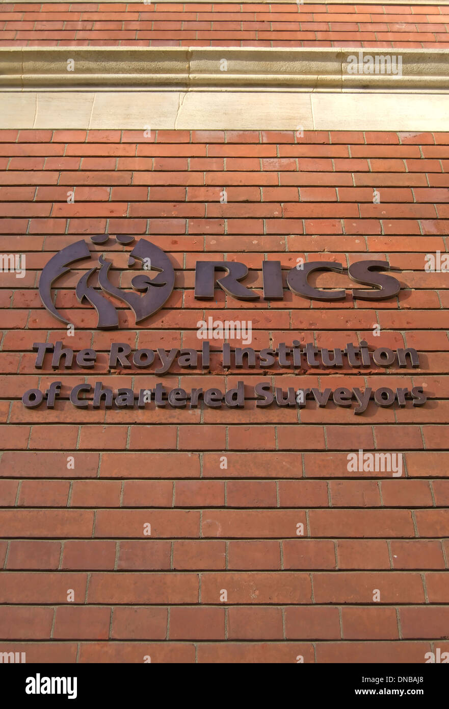 exterior with name and logo of  rics, the royal institution of chartered surveyors, london, england Stock Photo