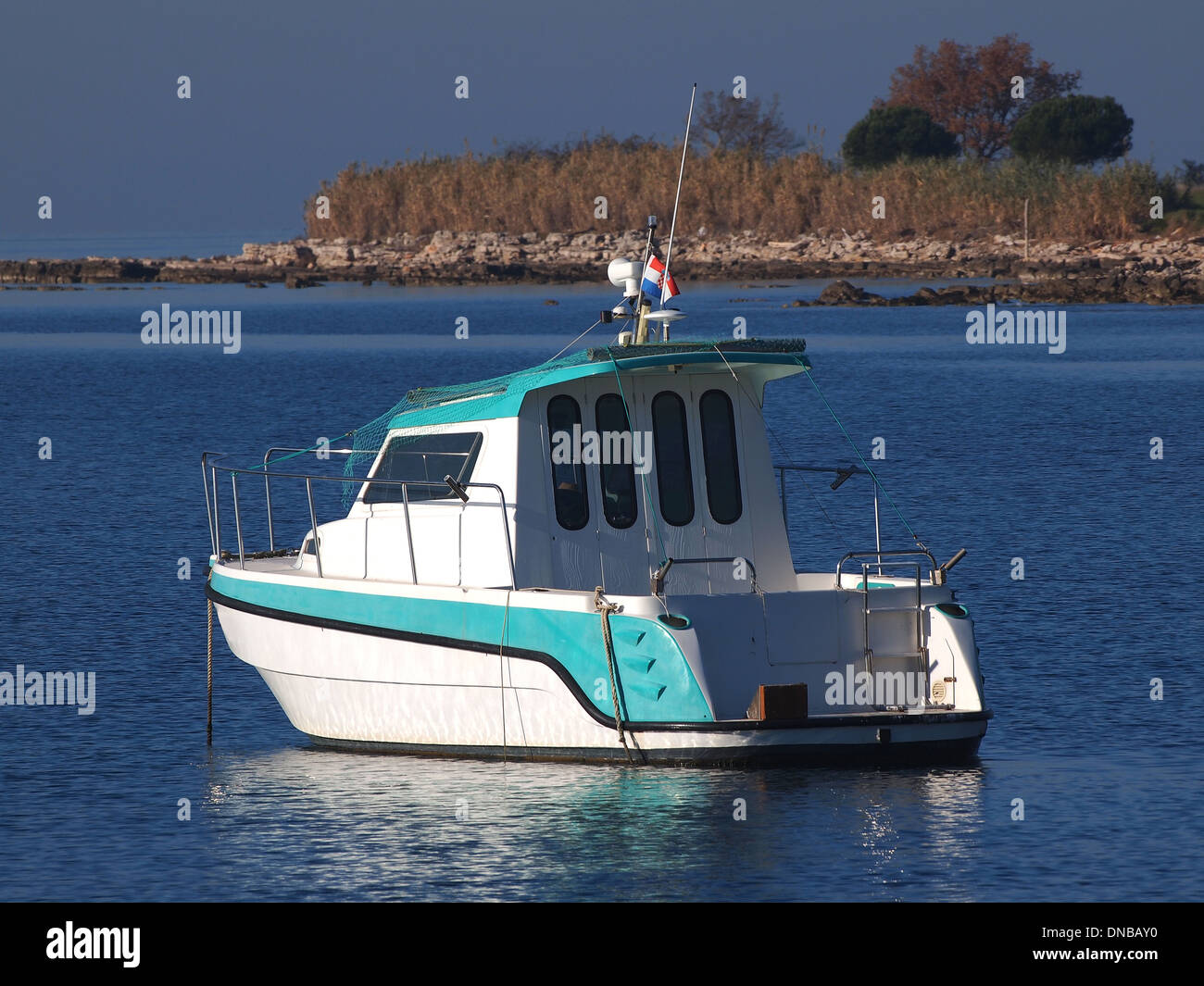 motorboat anchored in the bay Stock Photo - Alamy