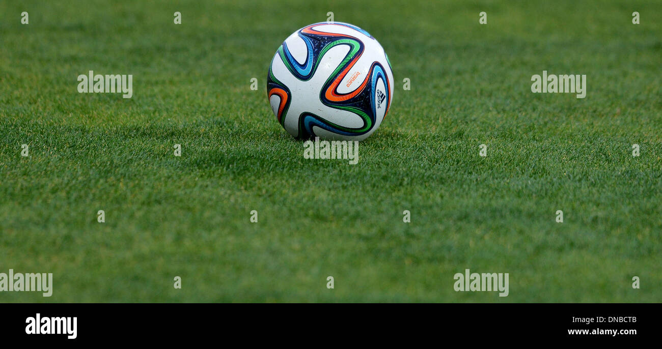 Agadir, Morocco. 20th Dec, 2013. The new World Cup ball Brazuca from Adidas during an FC Bayern Munich training session at the stadium 'Stade Adrar' in Agadir, Morocco, 20 December 2013. FC Bayern Munich will play in the semi-final of the Club World Cup in Agadir on 21 December 2013. Photo: DAVID EBENER/dpa/Alamy Live News Stock Photo