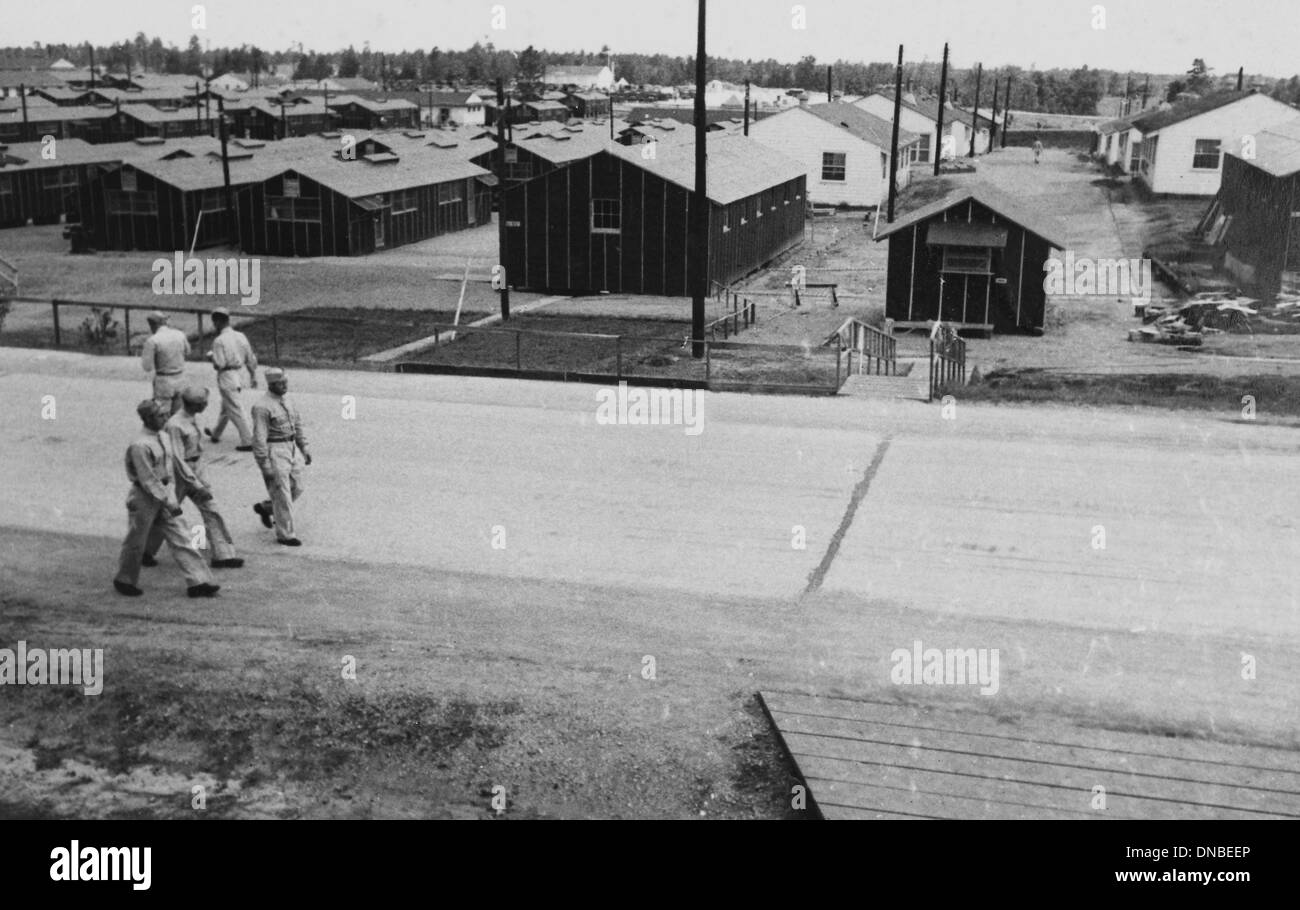 Group of Soldiers Walking Near Military Barracks, WWII, 2nd Battalion, 389th Infantry, US Army Military Base Indiana, USA, 1942 Stock Photo