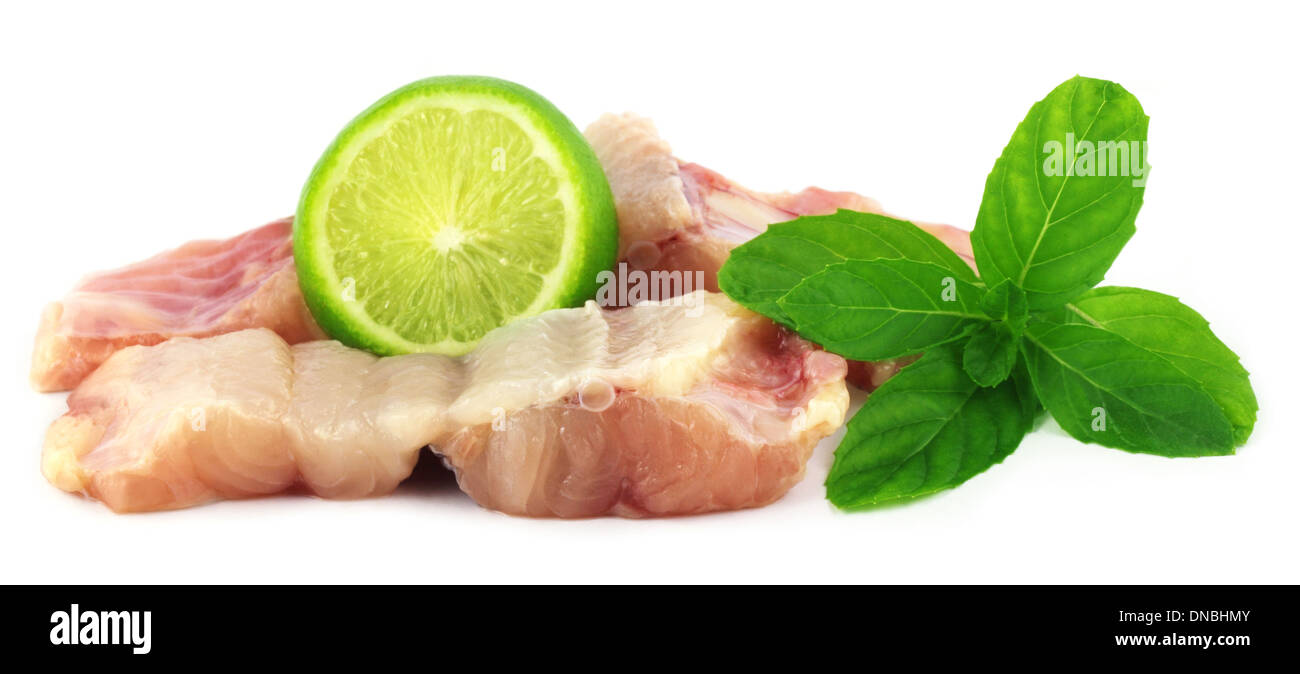 Pieces of Rita fish with mint and lemon Stock Photo