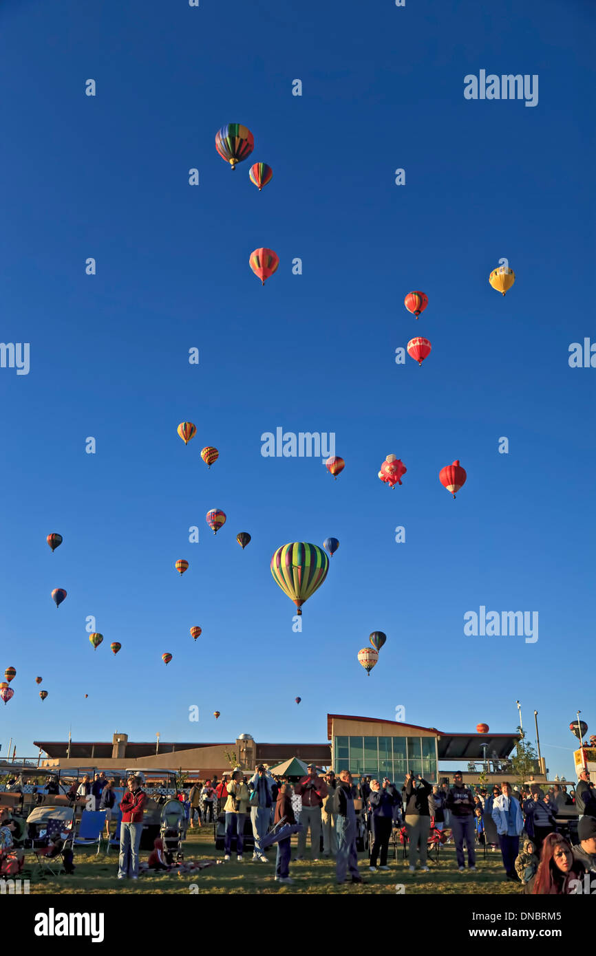 Crowd below hot air balloons in flight, Albuquerque International Balloon Fiesta, Albuquerque, New Mexico USA Stock Photo