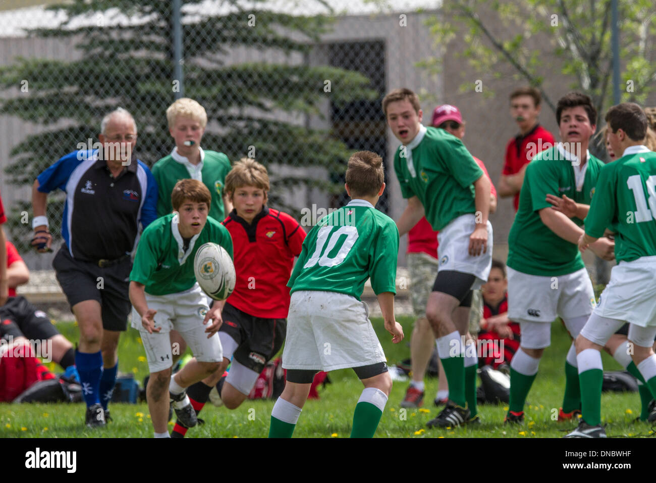 Athletic boys playing sports, high school rugby football Stock Photo
