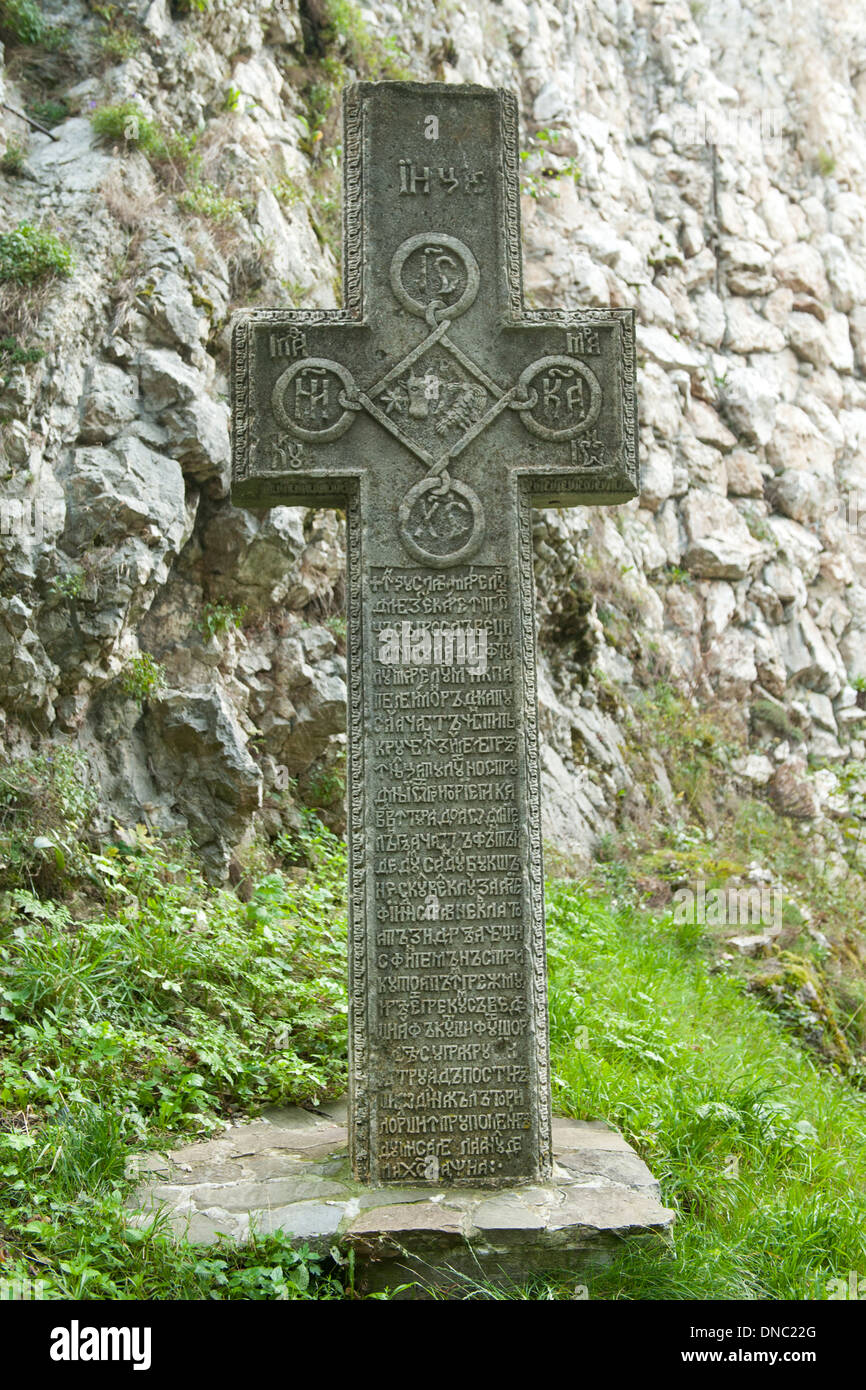 Stone cross near Bran Castle in the Transylvania region of central Romania. Stock Photo