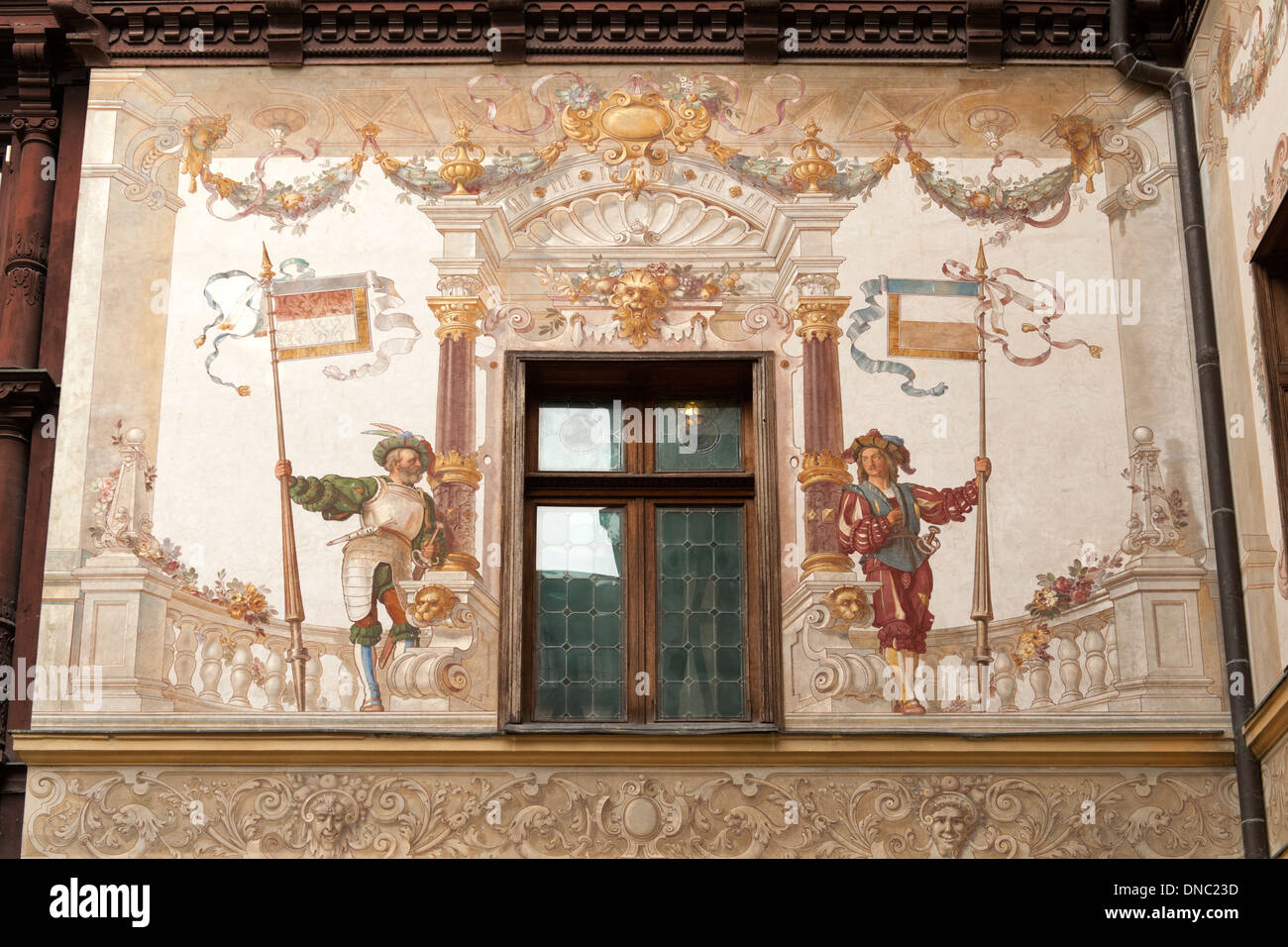 Mural and architectural detail in the courtyard of Peleș Castle in Sinaia in the Transylvania region of central Romania. Stock Photo