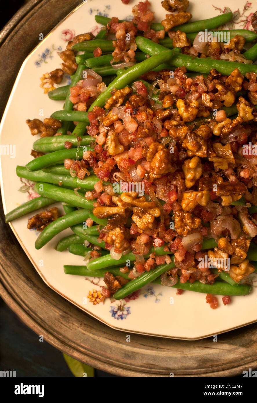 Green beans with Pancetta and walnuts Stock Photo