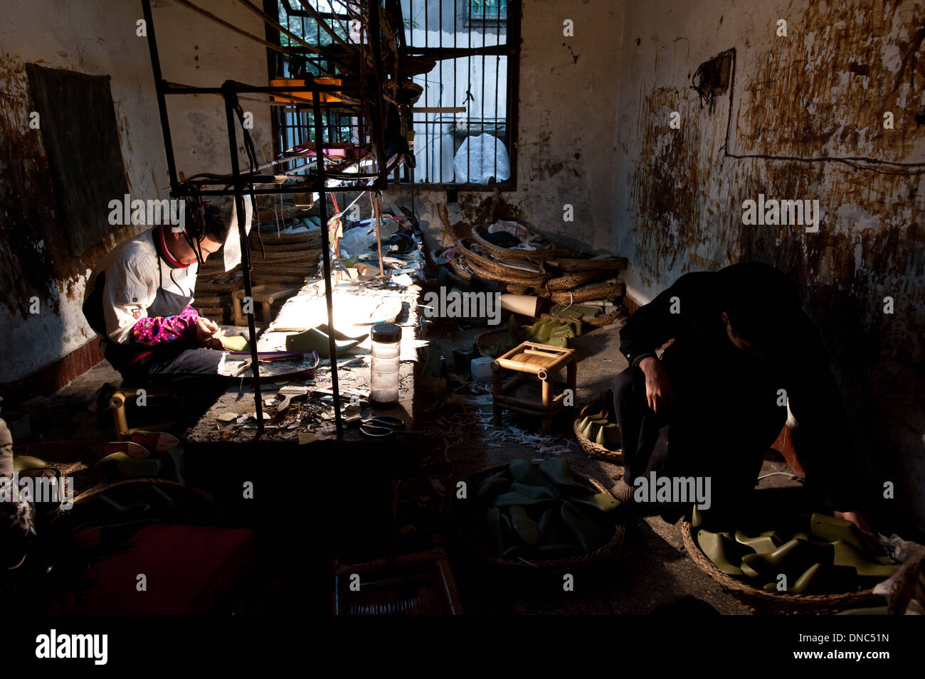 Chongqing, China - 31 December 2010: a run down factory where two ...