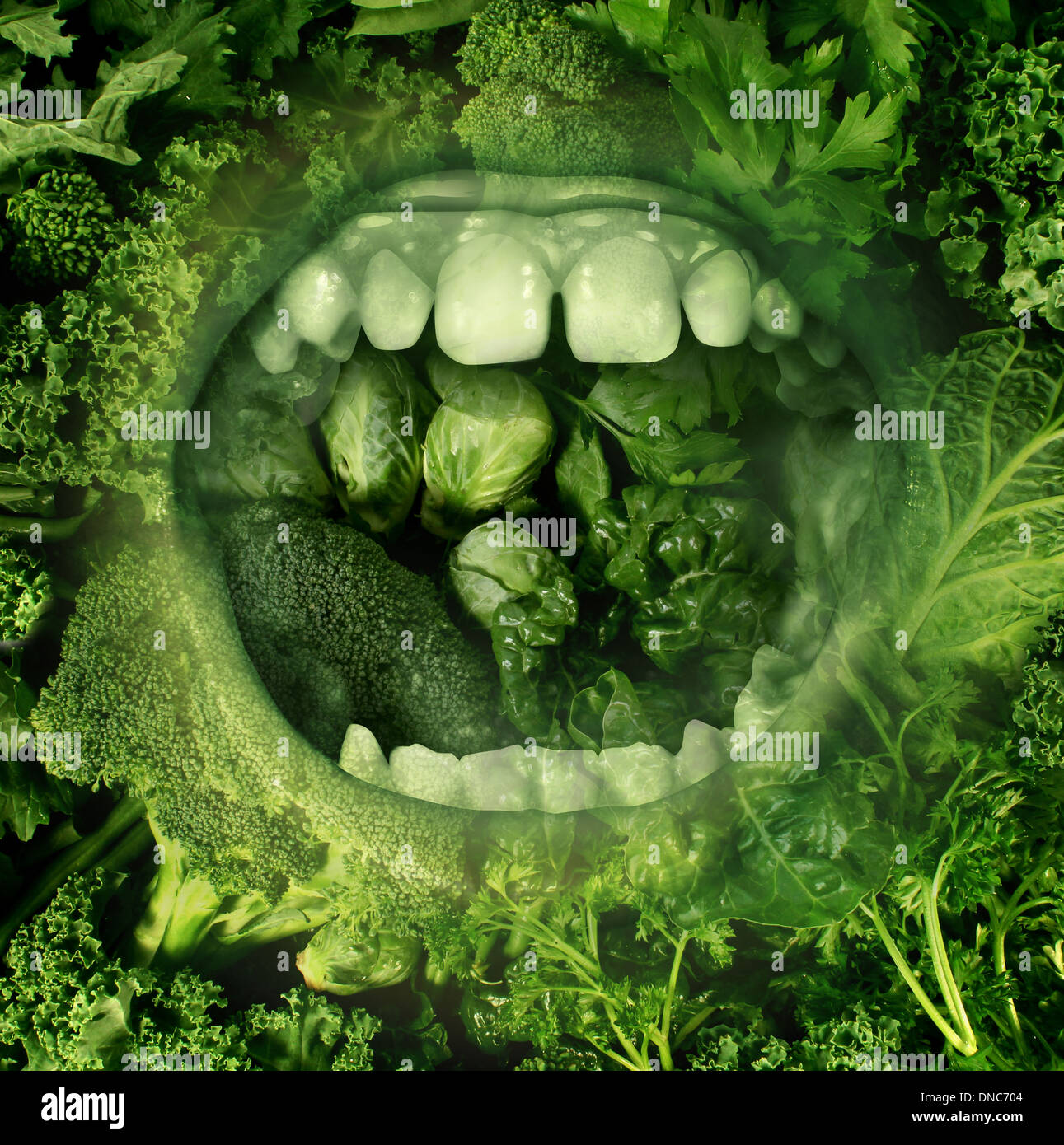 Eating green and healthy food concept with an open human mouth on a background of produce eating fresh vegetables as a symbol of good diet and nutrition and living a health lifestyle. Stock Photo