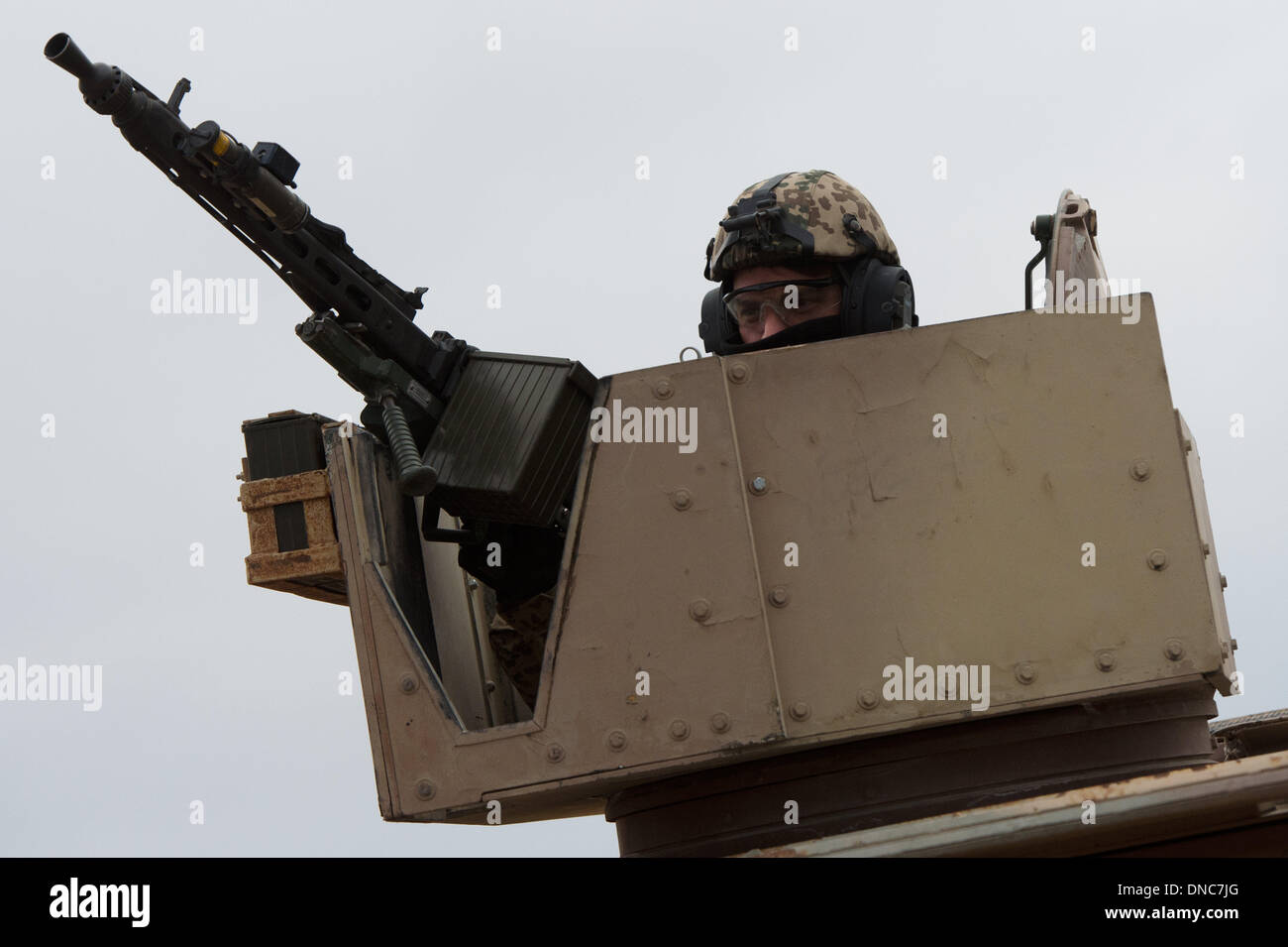 Mazar-e Sharif, Afghanistan. 22nd Dec, 2013. A German soldier secures ...