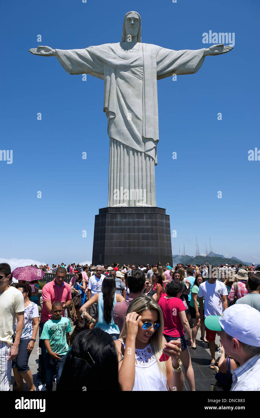 Crowds of tourists sightseeing at the Christ monument at Corcovado Rio de Janeiro Brazil Stock Photo