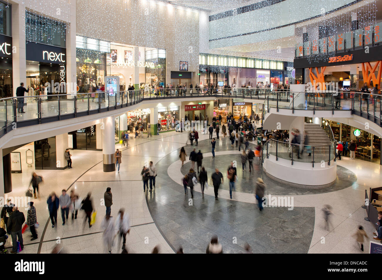 Manchester, UK. 22nd December, 2013. An internal shot of Manchester Arndale shopping centre during the Christmas lead up period. Over 210 stores are located within the bustling shopping complex. Credit:  Russell Hart/Alamy Live News Stock Photo