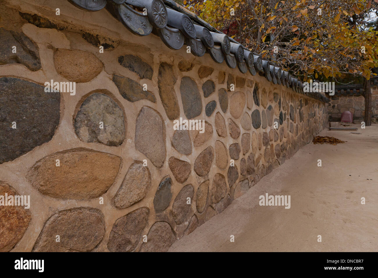 Stone wall fence in the traditional Hanok style - Gyeongju, South Korea Stock Photo