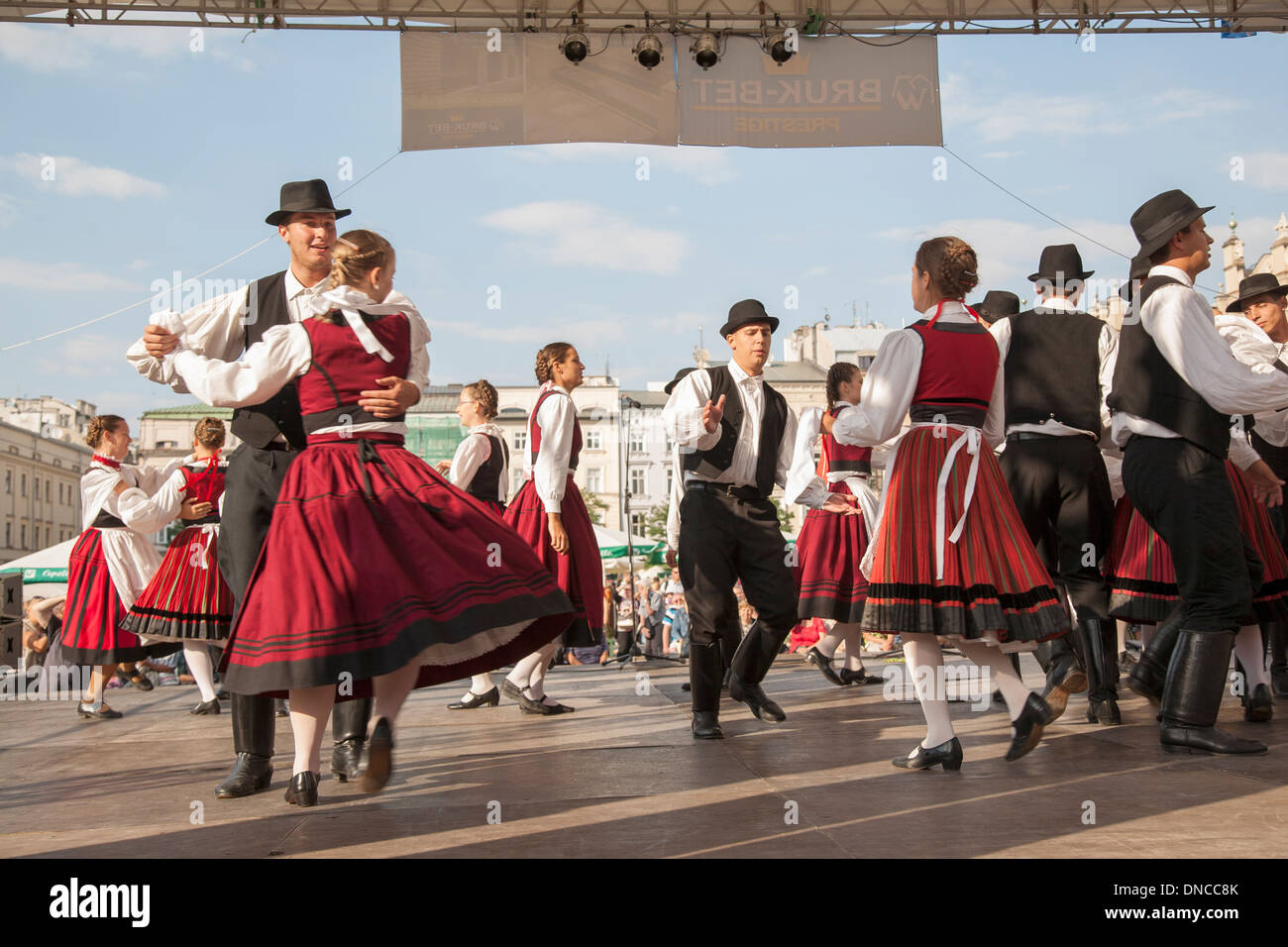 Traditional Polish Dancing in Rynek Glowny - Town Square, Krakow, Poland Stock Photo