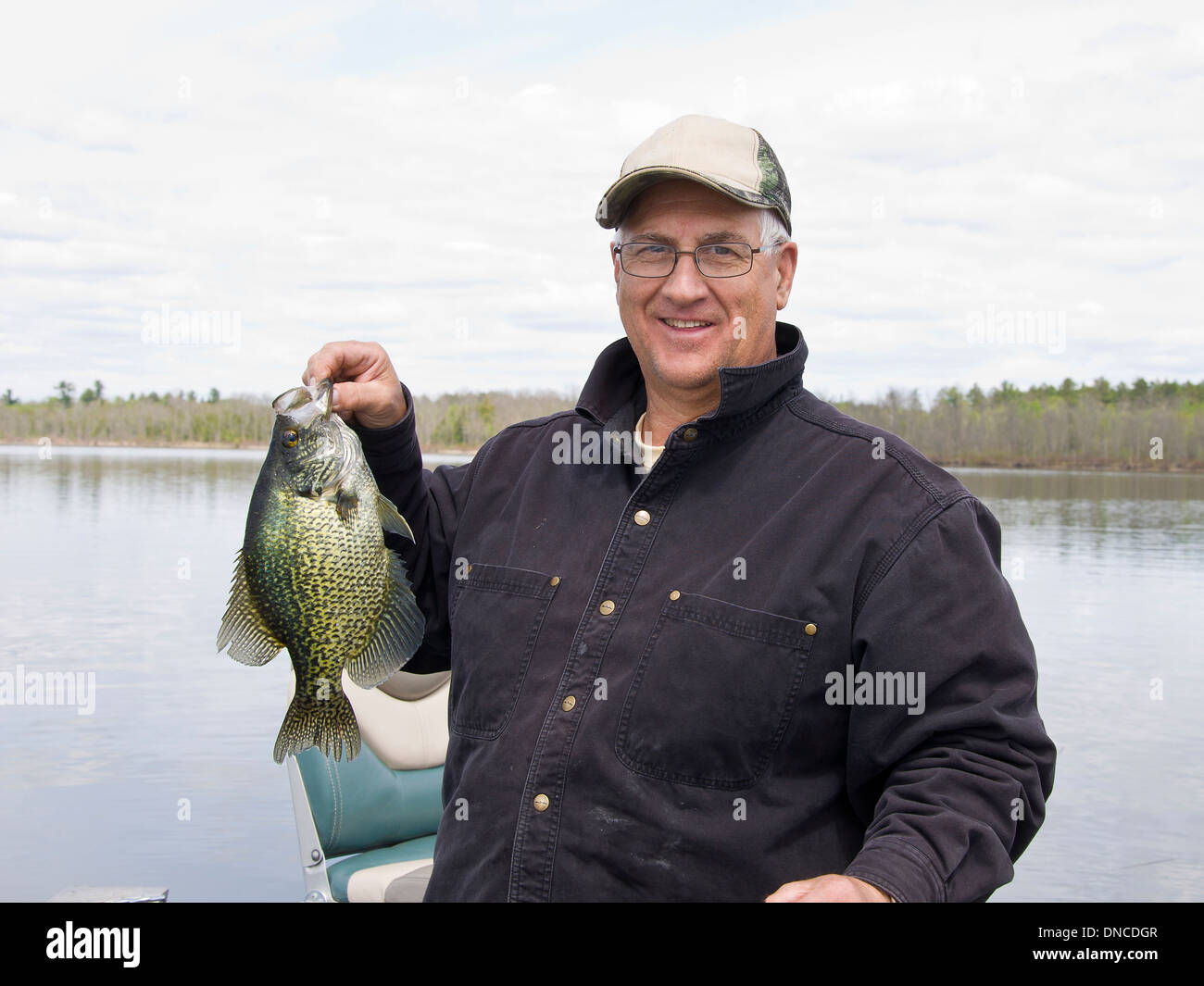 Fisherman with a large Crappie Stock Photo