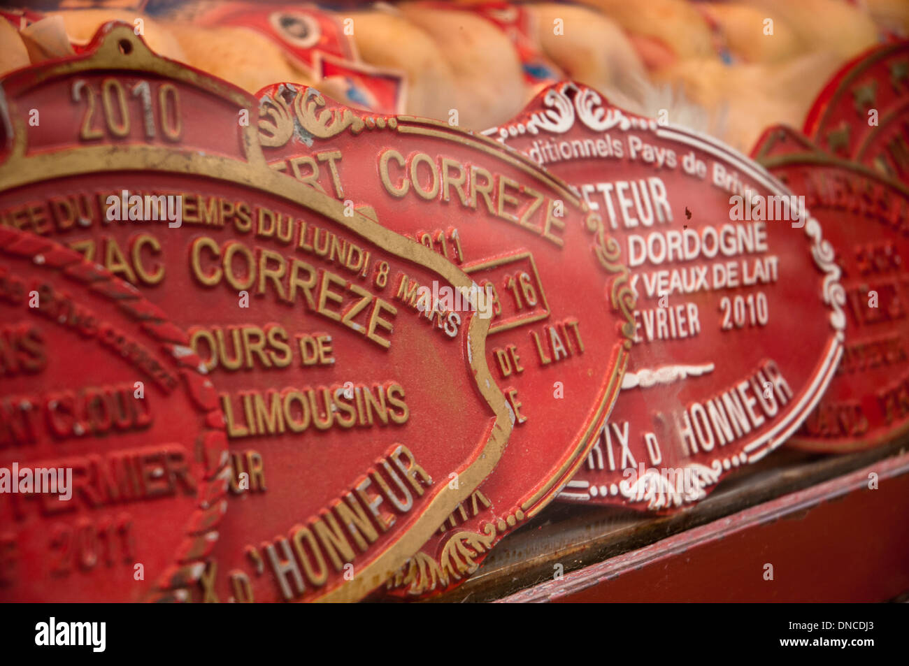 Collection of prizes in butcher's window, Ile Saint Louis, Paris, France Stock Photo