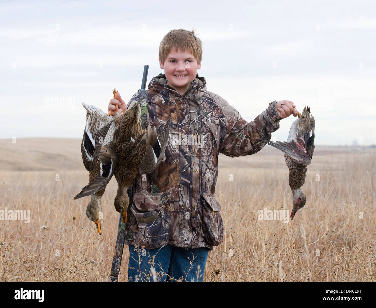 Young Boy hunting ducks Stock Photo Alamy