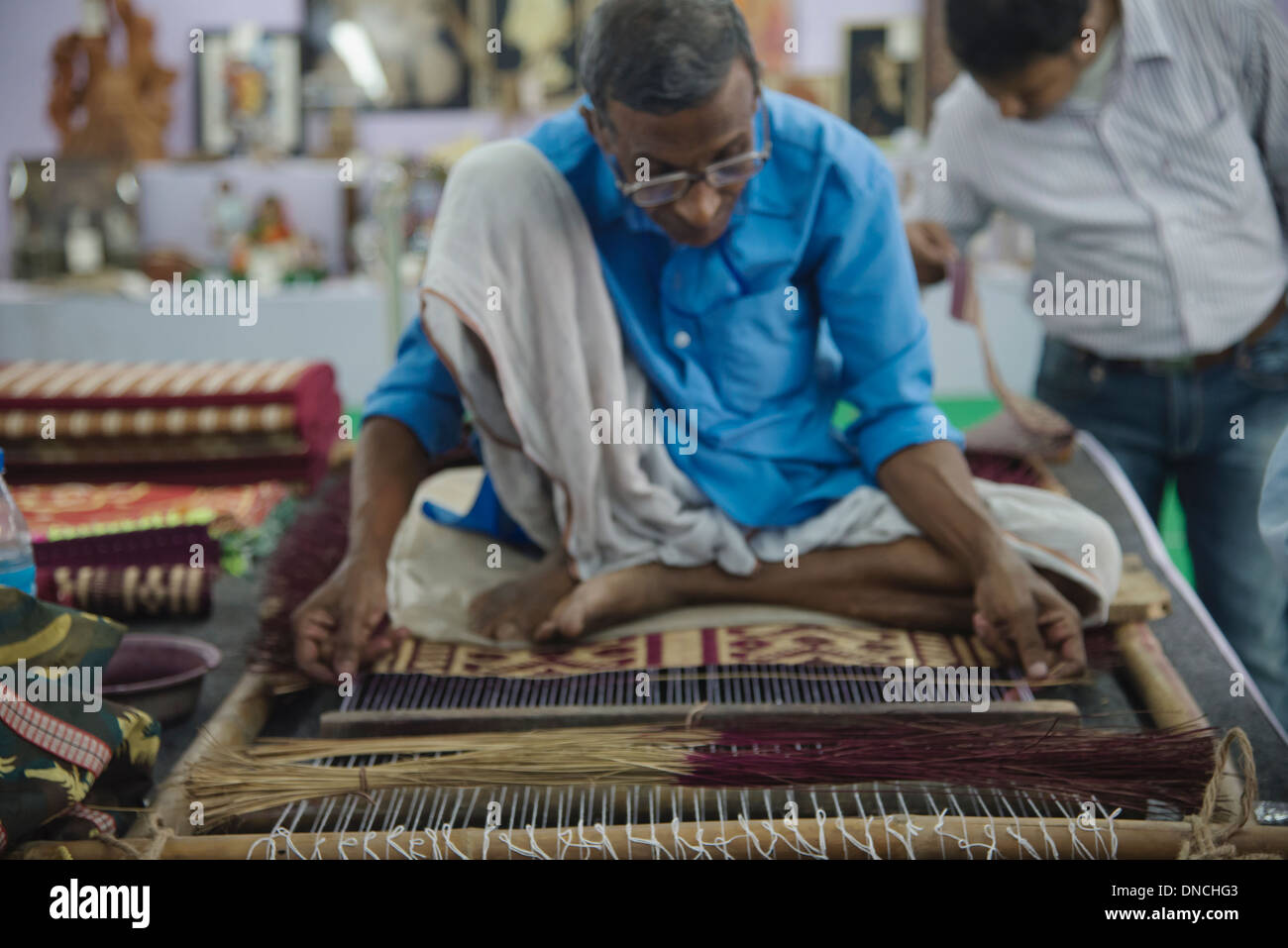 South Asian  male weaving. Stock Photo