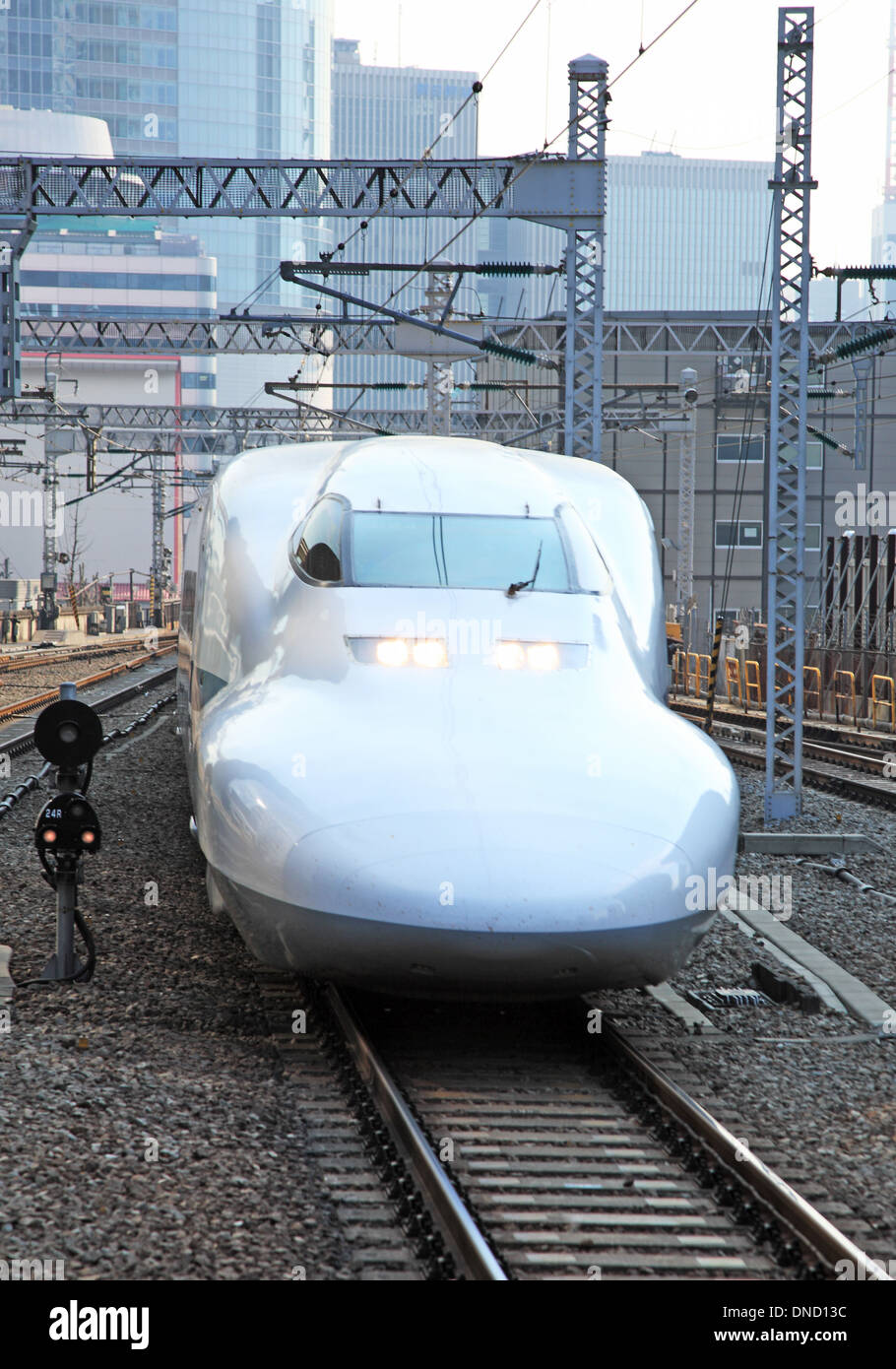 Japan, Tokyo, Shinkansen bullet train on tracks Stock Photo