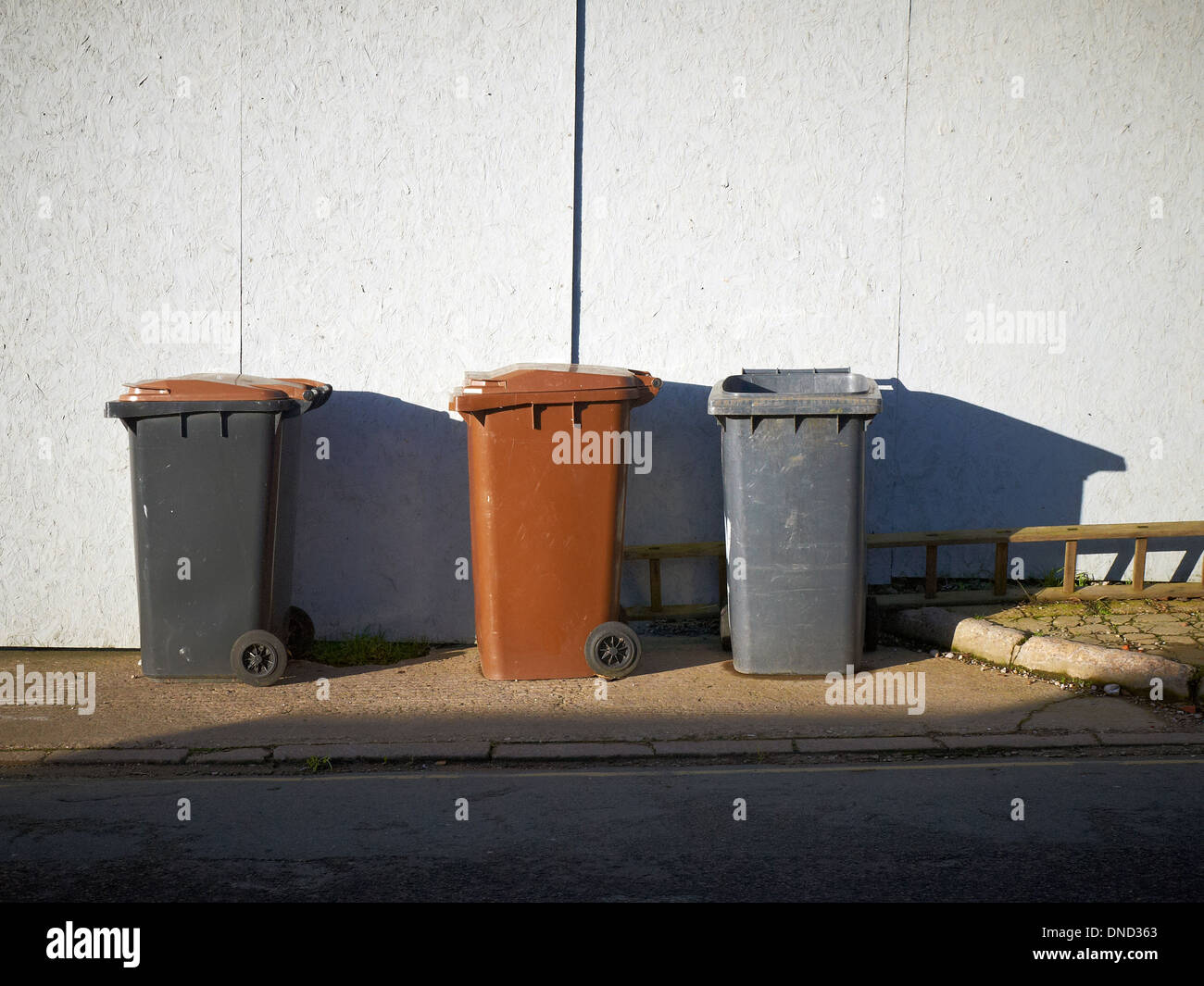 Three wheelie bins waiting for collection UK Stock Photo Alamy