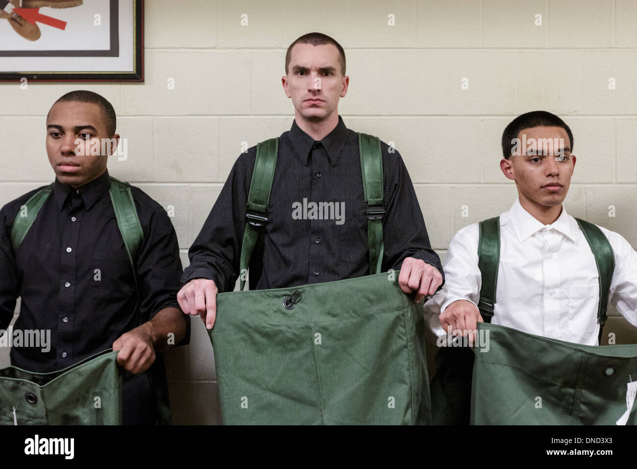 Newly arrived Marine Corps recruits are issued their equipment during