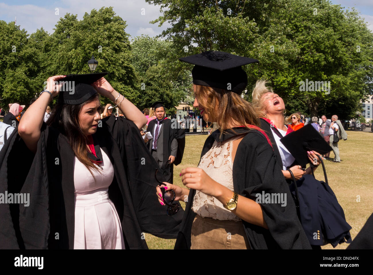 UWE (University of the West of England) students in College Green after graduation ceremony at Bristol Cathedral, UK Stock Photo